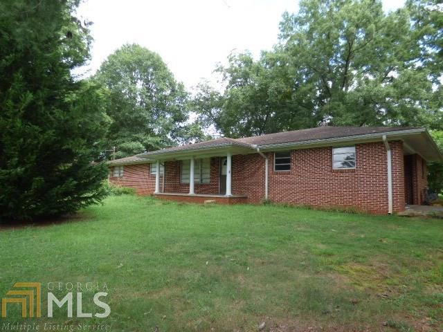 Solid 4 sided brick ranch! 3 BED/2 BATH on a great lot! Hardwood floors throughout much of the home. Both baths have original tile but it is in excellent condition. Large and level lot. Dont miss this one! Would make a great family home or a perfect rental. Needs renovations but this is a well- built home!