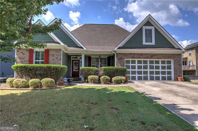 Welcome to 27 Summer Place, a beautifully maintained home in a quiet Cartersville neighborhood. Inside, you'll find an open floor plan with a spacious living room, abundant natural light, and a dining area that flows seamlessly into the kitchen. The kitchen offers plenty of cabinet space, modern appliances, and a convenient layout for everyday living and entertaining. The private primary suite is a true highlight, featuring a full bath and an oversized walk-in closet. Additional bedrooms are generously sized and perfect for family, guests, or a home office. Throughout the home, you'll find thoughtful updates, ample storage, and a functional layout designed for comfort. Step outside to enjoy a private, fenced backyard-ideal for cookouts, pets, or relaxing weekends. The home also offers a two-car garage and sits on a well-kept lot with great curb appeal. Conveniently located just minutes from downtown Cartersville, schools, parks, LakePoint, and shopping, this home delivers the perfect blend of comfort, function, and location.