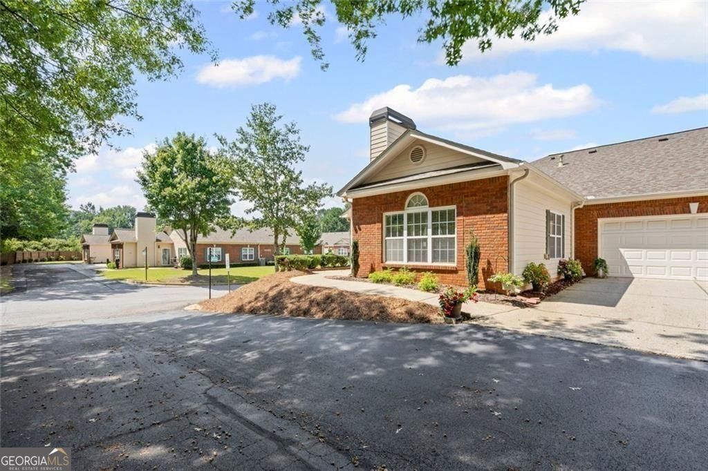 Photo of 460 Tribble Gap Road #102, Cumming, GA 30040 (MLS # 10754905)