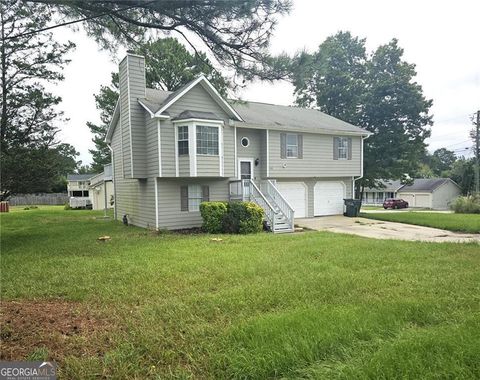 Photo of 2868 Rocky Pointe Way, Snellville, GA 30078 (MLS # 10619546)