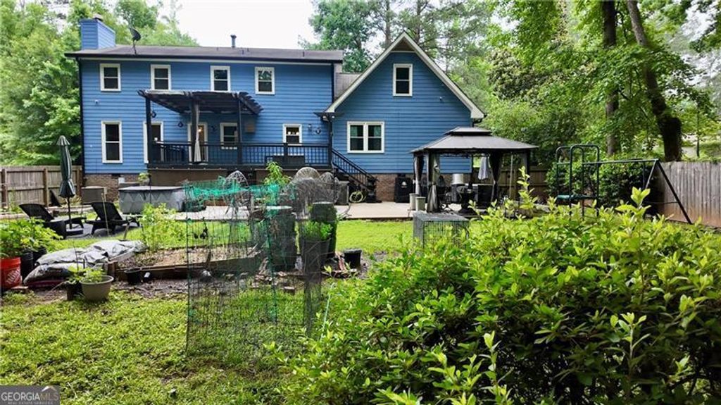 Photo of 5168 Hidden Hills Trace, Stone Mountain, GA 30088 (MLS # 10776823)