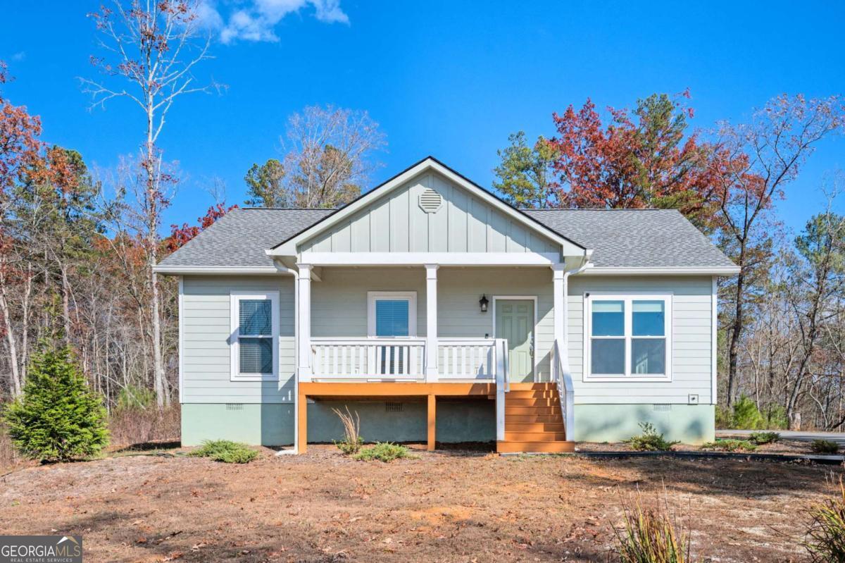 Nestled in the serene beauty of the North Georgia Mountains, this charming 3-bedroom, 2-bath ranch-style home offers the perfect mix of comfort, style, and tranquility. Step inside to an inviting open-concept layout with abundant natural light, creating a bright and airy atmosphere ideal for both everyday living and entertaining. The spacious living areas feature recessed lighting and newer carpeting, while the brand-new luxury vinyl plank flooring in high-traffic areas adds modern durability and low-maintenance ease. At the heart of the home, the updated kitchen flows seamlessly into the living room, making it easy to host gatherings or simply relax while enjoying mountain views through large windows. A dedicated laundry room adds convenience, and a brand-new HVAC system ensures year-round comfort-cool in the summer, cozy in the winter. Whether you're savoring quiet moments indoors or embracing the beauty of the surrounding outdoors, this home offers the best of mountain living. Don't miss your chance to own a peaceful retreat in one of North Georgia's most desirable mountain communities.