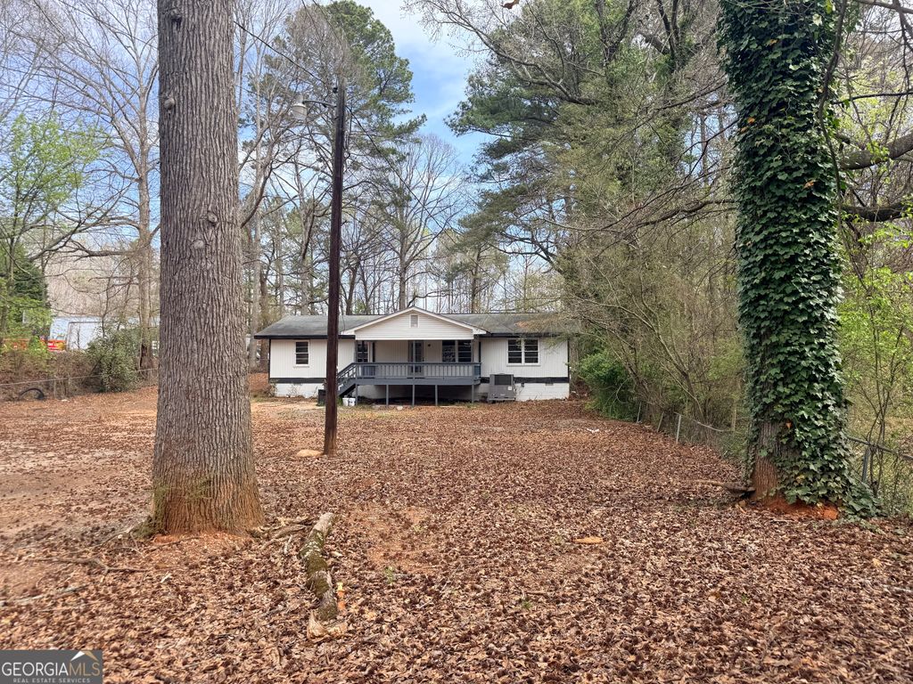 Photo of 576 Hillcrest Rd, Lilburn, GA 30047 (MLS # 10719053)