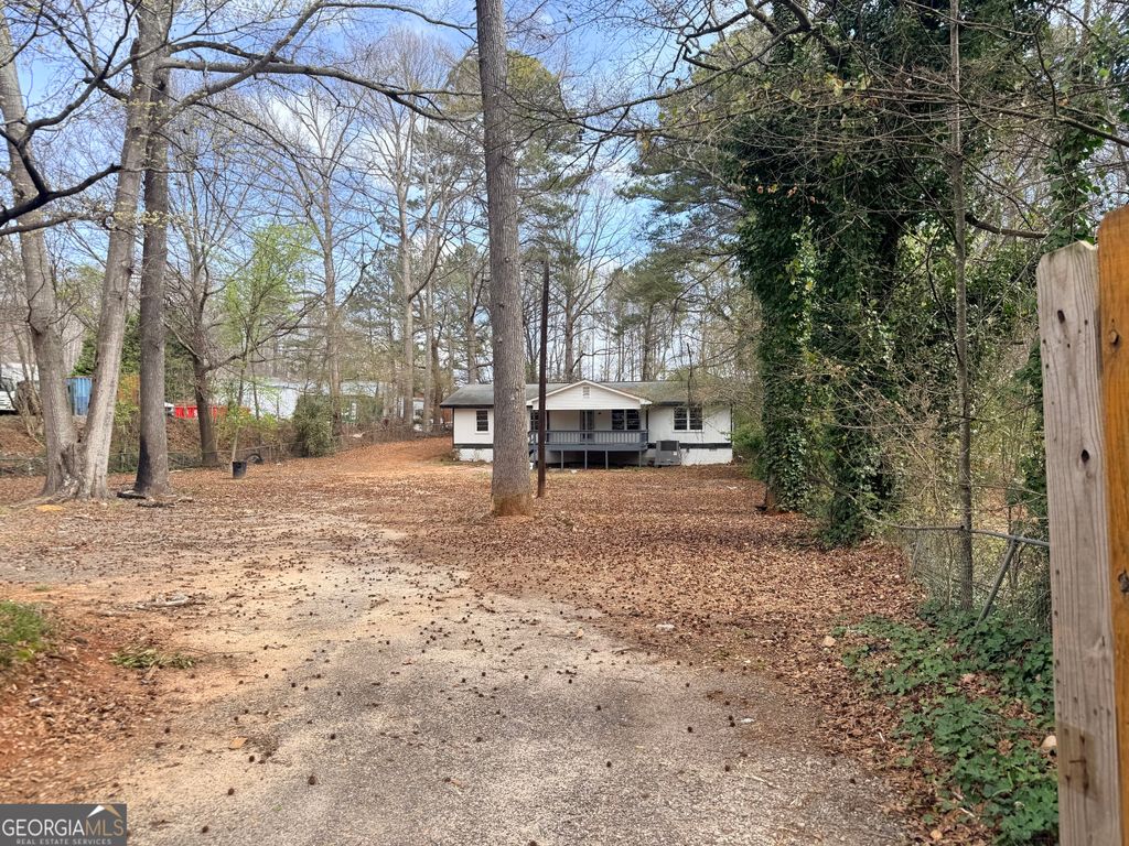 Photo of 576 Hillcrest Rd, Lilburn, GA 30047 (MLS # 10719053)
