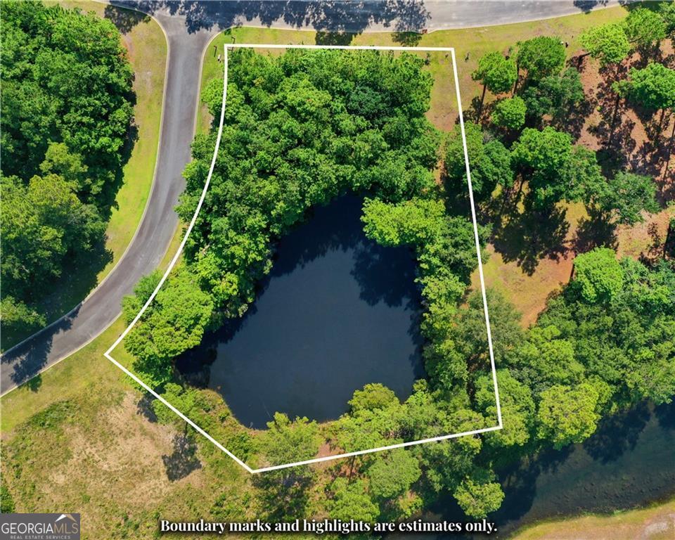 Build your dream home on this almost ONE ACRE LOT in sought after Maiden Creek Landing, a gated community with deep water access on the Little Satilla River, a beautiful clubhouse, with private docks and a convenient boat hoist. Conveniently located off Exit 26, a little over a mile East on Dover Bluff Road. The homesite is 0.94 acres and has a beautiful pond and NO FLOOD Insurance required.