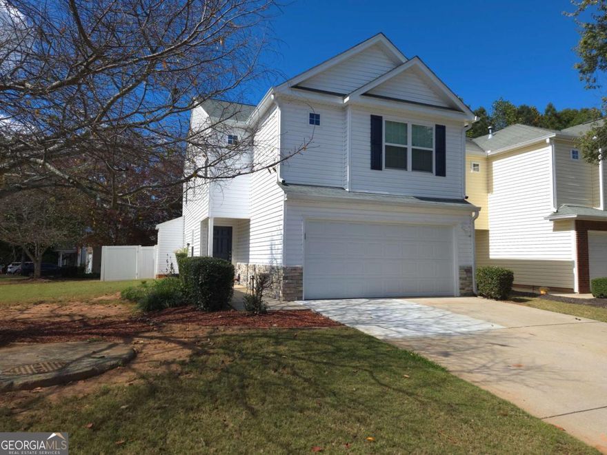 Welcome home to this beautifully maintained and thoughtfully designed 3-bedroom, 2.5-bathroom home. This 2003-built gem offers the perfect blend of suburban serenity and urban-inspired convenience - all within Forsyth County's top-rated school district. Step inside to an inviting open-concept main level space, where a sunlit living area flows seamlessly into a sleek kitchen and adjacent dining space that opens to a private rear patio, perfect for al fresco dining in a private backyard. Upstairs, the primary suite serves as a tranquil haven with a walk-in closet and en-suite bath. Two additional generously sized bedrooms share a full bath, providing ample space for family or guests. There is a lofted space that can be used as an excellent office space or can be converted into a fourth bedroom.  Outside, enjoy low-maintenance living with the HOA's lawn care, allowing more time to explore the vibrant shopping just moments away. So close to award-winning restaurants, boutique shops, an artisan craft brewery, and the expansive Forsyth County Family YMCA - complete with fitness centers, pools, and community programs. Stroll to weekly farmers' markets, live music on the Village Green, or outdoor concerts in this charming, new-urbanism haven.  Conveniently located minutes from the sparkling shores of Lake Lanier for boating and hiking adventures, the bustling North Georgia Premium Outlets, Dawsonville's mountain trails, and Northside Forsyth Hospital, this address delivers the best of North Georgia living. Whether you're seeking a peaceful primary residence or a savvy investment in a renter-friendly neighborhood, 5305 Mountain Top Place invites you to embrace a lifestyle where community, convenience, and charm converge.  Don't miss this rare opportunity - schedule your private tour today and make this your forever home!