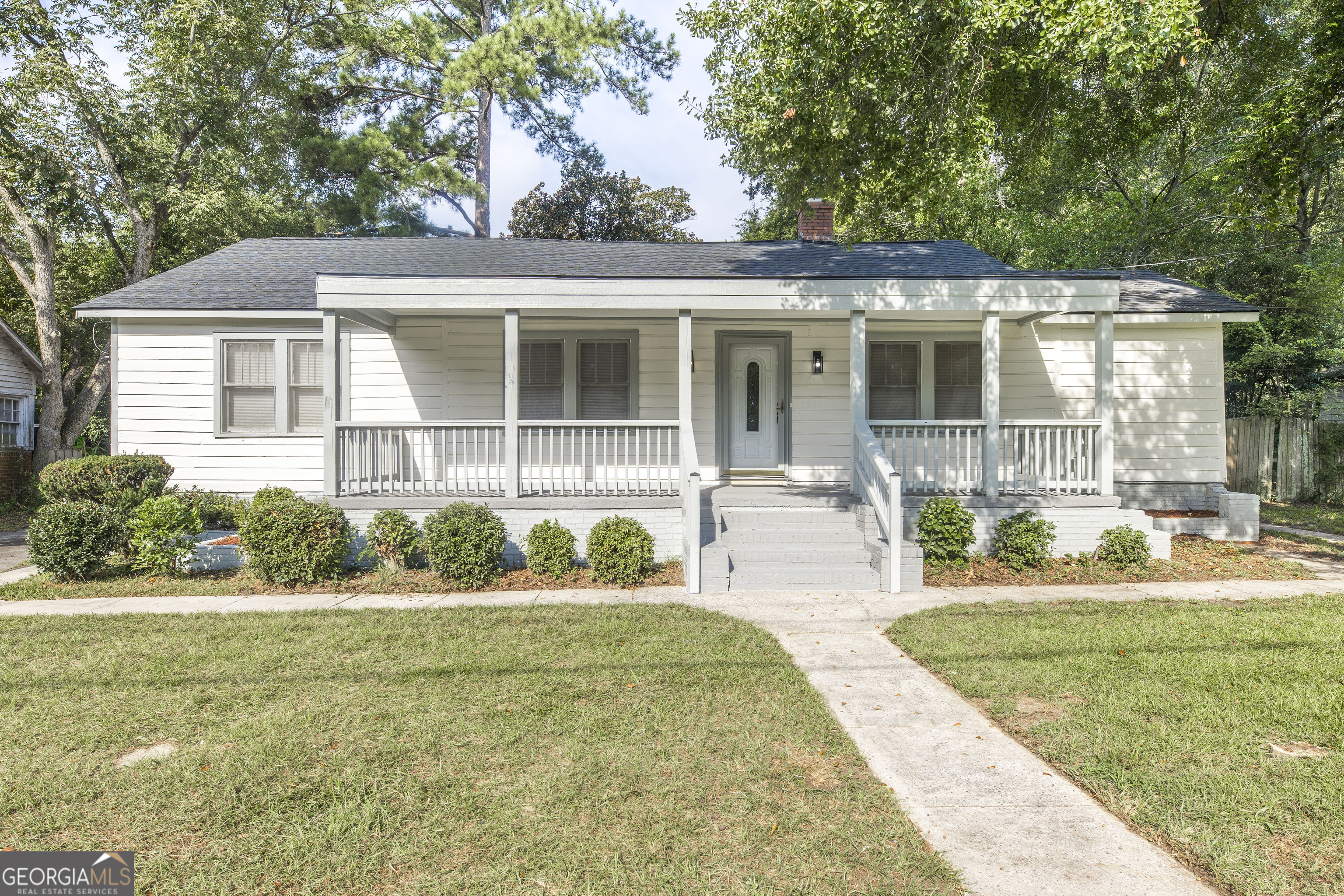 This spacious 3-bedroom, 2-bathroom remodeled home in the heart of Macon has been completely updated and is conveniently located close to shopping, dining, and downtown. Sitting on over 0.7 acres, it offers plenty of outdoor space along with a move-in ready interior featuring fresh paint and new flooring throughout, including carpet and luxury vinyl planks. The fully equipped kitchen comes with a refrigerator, stove, washer, and dryer, plus brand-new cabinets, countertops, and modern finishes. Both bathrooms have been tastefully updated with new vanities and showers. Major updates include a new roof, new hot water heater, and brand-new A/C, giving you peace of mind for years to come. This home qualifies for FHA, VA, conventional, or cash offers-come tour this beautiful property today!