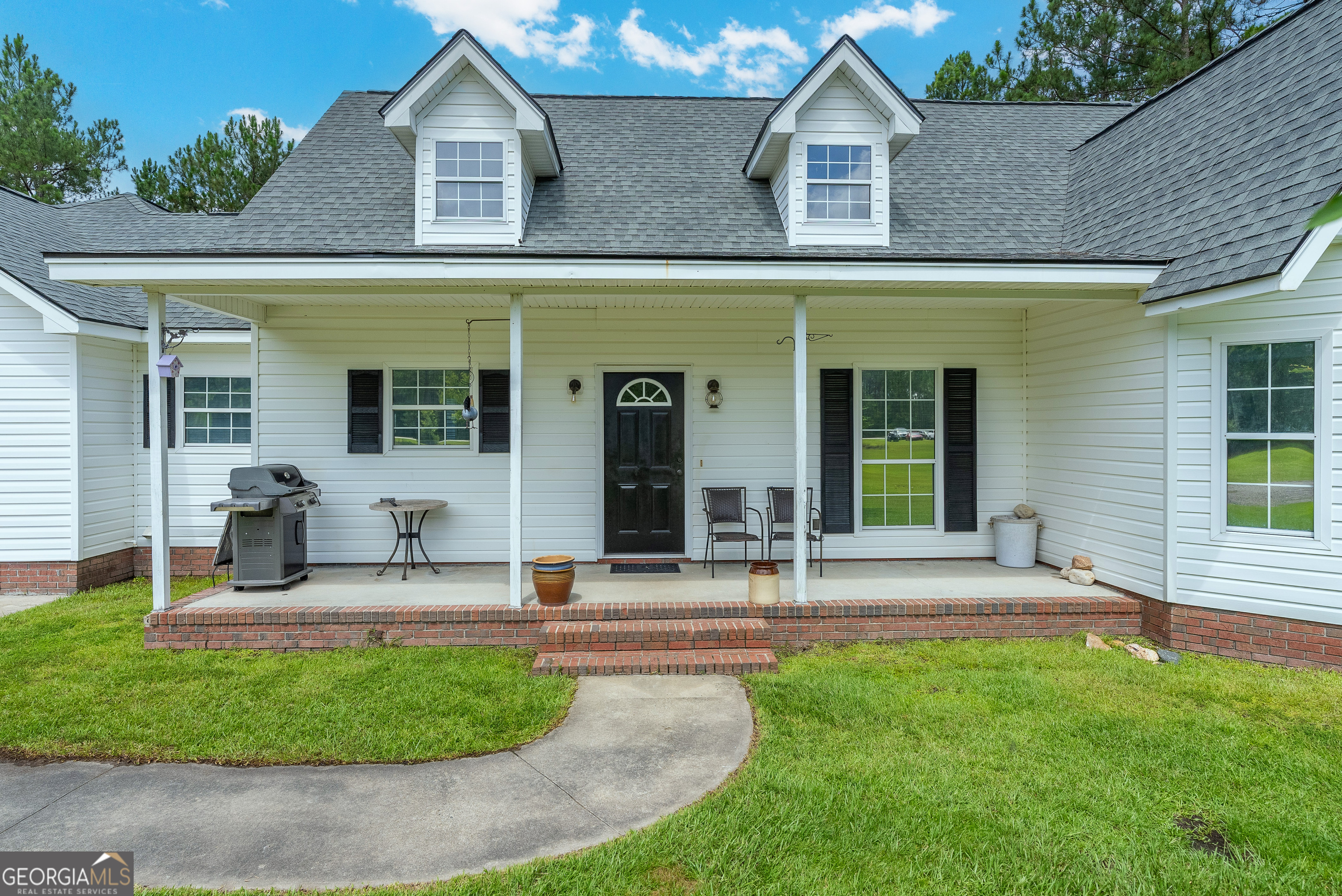 Welcome to 400 Smith Road in Waycross, Georgia! Nestled on 5.22 peaceful acres, this beautifully updated home offers 3 spacious bedrooms, 2.5 bathrooms, and a versatile bonus room-perfect for a home office, playroom, or guest suite. Inside, you'll find 2,351 square feet of heated and cooled space featuring a blend of wood and LVP flooring. Enjoy the comfort and reliability of a brand-new roof and a new HVAC system. Outside, relax and unwind beside your very own private pond-ideal for fishing, wildlife watching, or just soaking in the tranquility of the countryside. This move-in ready property offers the perfect blend of modern comfort and quiet country living!