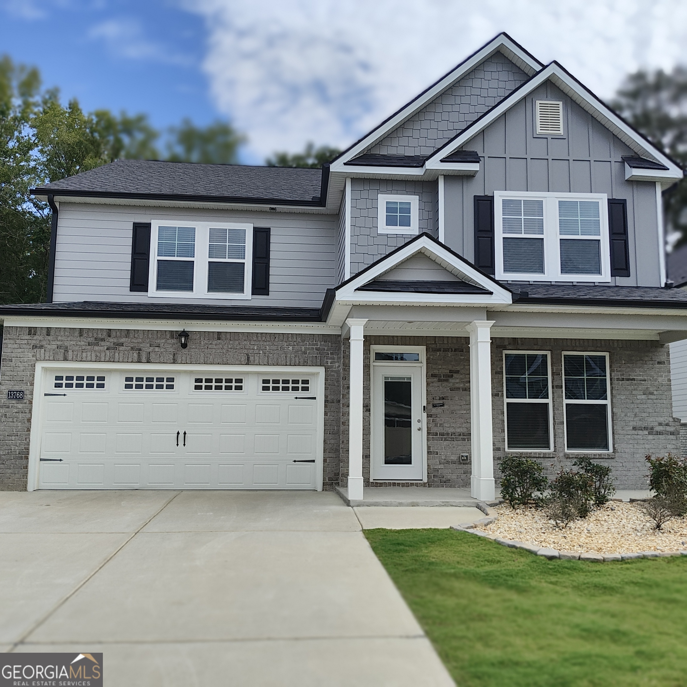 This stunning 4-bedroom, 3-bathroom home is an exceptional find in the coveted Wildwood community. Spanning 3,342 square feet, it's situated on a premium lot at the end of a quiet cul-de-sac. This prime location offers unparalleled privacy with no rear neighbors and a serene, tree-lined backyard. Step inside and be greeted by the elegant Hampshire floorplan. The main level features a formal dining room perfect for gatherings, a convenient guest bedroom and full bath, and an inviting, open-concept living space. The gourmet kitchen is a chef's dream, complete with contemporary cabinetry, quartz countertops, and a full suite of stainless steel appliances, including a double oven. A butler's pantry seamlessly connects to the dining area, making entertaining effortless. The family room, centered around a cozy fireplace, is the perfect spot for everyday life. Upstairs, the home transforms into a true private sanctuary. A second family room offers flexible space for a movie night, playroom, or home gym. The expansive owner's suite is a quiet retreat, featuring a private sitting area ideal for a reading nook or home office. The spa-like ensuite boasts dual vanities, a separate shower, and a relaxing garden tub, complemented by an oversized walk-in closet. Two additional bedrooms, a hall bath with handheld showerheads, and a dedicated laundry room provide ample space for the entire family. This home has been meticulously upgraded for modern living and comfort. Smart home technology includes two Ecobee thermostats, while premium exterior features like upgraded SOD, a custom wood fence, and enhanced landscaping add to the curb appeal. All kitchen and laundry appliances, including the washer, dryer, and refrigerator, are included. The Wildwood community offers fantastic amenities, including a swimming pool, clubhouse, tennis and basketball courts, and a walking trail. This is more than a home; it's a lifestyle.