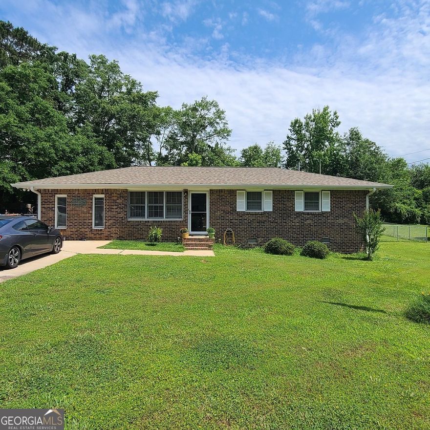 Discover the charm of this delightful ranch-style retreat boasting 4 cozy bedrooms and 2 inviting bathrooms, all nestled on a spacious 0.72-acre flat lot. The durable 30-year architectural shingle roof is under 10 years old, complemented by brand new roof decking and attic insulation to keep you comfortable year-round. Enjoy efficient cooling with a new A/C condenser installed in 2021 and modernized toilets for your convenience. The property also features a 10x20 storage shed or workshop equipped with electricity, perfect for your projects. Plus, the septic tank was recently serviced in 2024, ensuring peace of mind. This home is ready for your personal touch-come and make it your own!