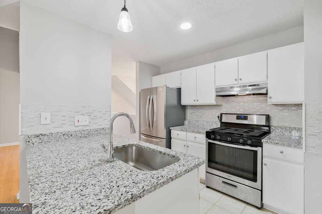 Photo of 1064 Creatwood Circle SW, Smyrna, GA 30080 (MLS # 10675676)