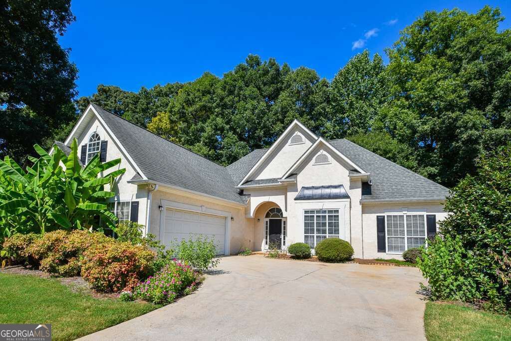 Photo of 104 Sweetbriar Walk, Stockbridge, GA 30281 (MLS # 10840772)