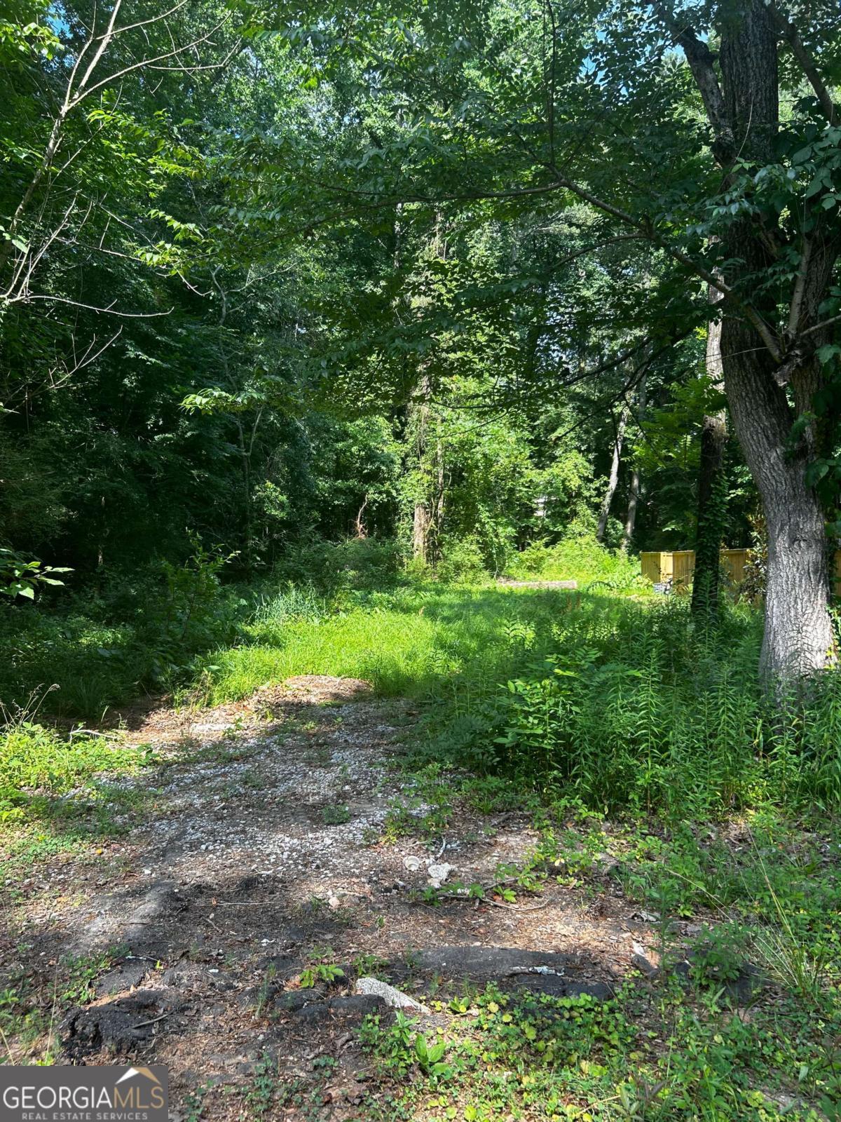 MOTIVATED SELLER!! CREATIVE BUILDERS....THIS ONE IS FOR YOU! Bring your BUILDERS and INVESTORS to this rapidly developing, prime land in the heart of Atlanta, where urban convenience meets suburban tranquility. This almost half acre parcel is ideally located minutes to downtown, Hartsfield Jackson Airport, & shopping. Easy access to I-285, I-75/85 and public transportation, ensures convenience for residents and commuters. Come build your dream home or add to your investment portfolio! Purchase this lot with two others and save!!