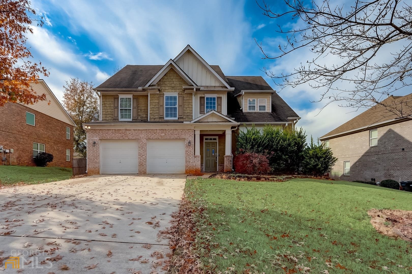 This McDonough three-story home offers a two-car garage.
