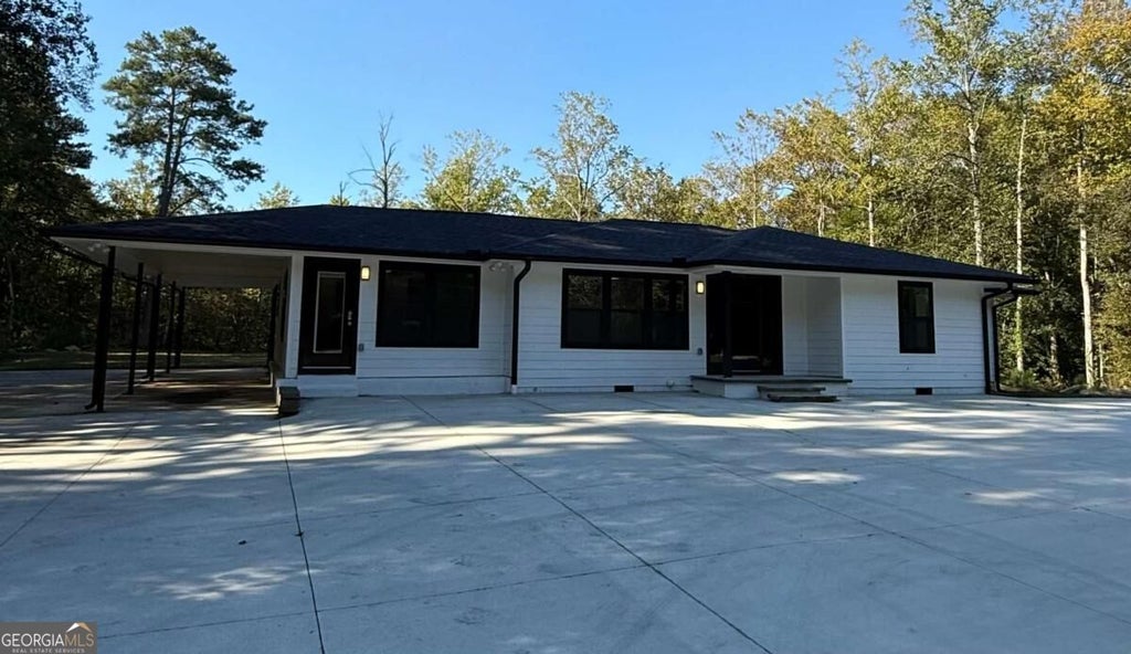 Photo of 2521 Reinhardt College Parkway, Canton, GA 30114 (MLS # 10874897)