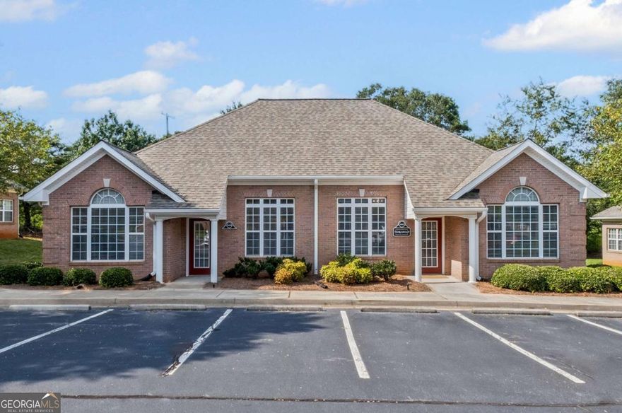 Less than a mile from Crabapple Market, this renovated office is where work meets vibe. Two units combined into one bold space: dual kitchenettes, 7 light-filled offices, a conference room, team gathering space, lobby, and lots of parking! Thoughtfully updated with aesthetics and functionality in mind, where you can work hard and celebrate wins as a team. Updated bathrooms, kitchenettes, flooring, paneling, fixtures and more. Turnkey investment or owner occupied, a fabulous place to be "in office"!  It's fresh, it's functional, and it's got a story-because this is the kind of place where legends are made.