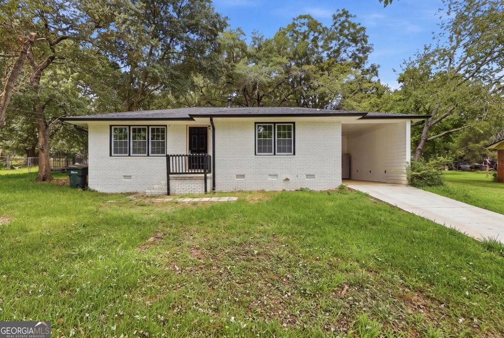 Photo of 8184 Laurel Drive SW, Covington, GA 30014 (MLS # 10821003)