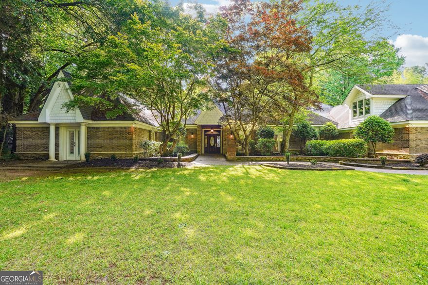Welcome to 13039 Freemanville Road! This luxury 9 bedroom and 10.5 bathroom home is located in Alpharetta, Georgia. Drive into the gated entrance into this beautifully landscaped estate. This home is nothing short of exquisite with craftsmanship and custom details: a Stunning foyer, 12+ dining room, a gourmet kitchen featuring quartz countertops and gold kitchen fixtures and stainless appliances, custom cabinets, walk-in pantry and large keeping room with fireplace which opens to the courtyard. The main level features 3 bedrooms /3.5 baths including a massive owner's suite with sitting area, trey ceilings and spacious custom closet. Head upstairs using the front & rear staircases~the upper level features 3 ensuite bedrooms, 4 full bathrooms and a very generously sized Junior Owner's Ensuite. Take a breath in the beautiful courtyard and enjoy the fountain or the outdoor brick pizza oven. The guest house holds a beautiful 2 story foyer, full kitchen 2 bedrooms/2 bathrooms and laundry room. The pool house has room for a full bar, additional office space, or a content area. This home is immaculate and very well maintained with so many custom touches throughout including 3 fireplaces, an infrared sauna, steam room, massage parlor, 5 car garage with tons of storage. Seller is open to owner financing with flexible terms for qualified buyers. Great opportunity for buyers seeking alternative financing options.