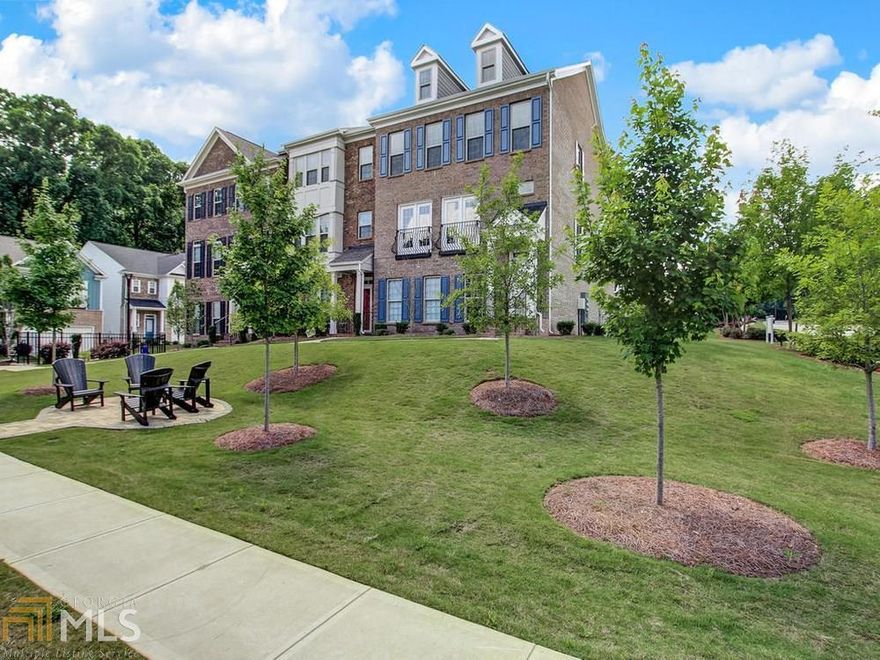 Priced $60k below the new construction base price for this Carver floorplan, plus over $17k in upgrades throughout! This elegant home boasts the largest layout in the picturesque community, complete with luxury style & an elevated level of craftsmanship. The light-filled living space features gleaming hardwoods & impeccable detail throughout. Open, flowing floorplan includes 2 spacious sitting areas, office nook, & dining space leading to a covered deck. Gorgeous kitchen is at the heart of the main floor, with glass tile backsplash, Quartz counters, large island with seating, & premium stainless steel appliances. Sleek, oversized primary bedroom suite includes a walk-in closet, private patio, & lovely en-suite bath with spacious stonetop vanity & lavish shower with rainfall showerhead. Generously sized secondary bedrooms & baths, including a terrace level guest suite (currently used as a media room) that creates the ideal space for hosting friends & family. Additional features include mudroom, 2 car garage, custom blinds & built-ins, dimmable lights with controller. Amenity rich community with swimming pool, clubhouse, dog park, business center & more! Minutes away from Emory & community connects to Mason Mill Park walking trail.