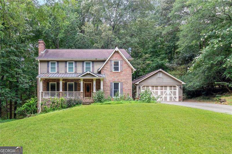 Location is everything and this home is no exception! Sitting on just under a 1-acre lot, this spacious home boasts a finished terrace level, an in-ground pool, a detached garage including a workshop area, and so much privacy. There is so much potential here in this great home which makes it a must see. This 5 bedroom, 3 and 1/2 bath property features a custom kitchen with stainless appliances, stained cabinets, corion counters, and a view to the sunroom which overlooks your private back yard oasis. The upper level offers 4 bedrooms including the master retreat with a jetted tub, separate shower, and double vanities. The finished terrace level provides another living area with a fireplace, office, bedroom area, and a full bathroom. Don't delay and call for your private showing today!