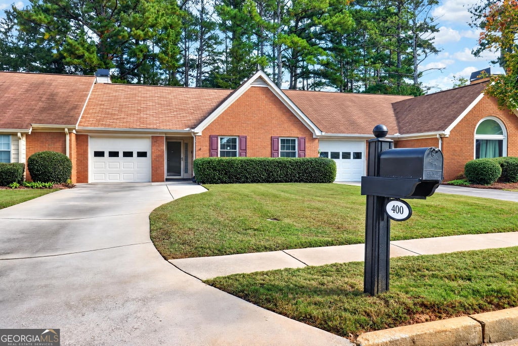 Photo of 400 Jeff Davis Place, Fayetteville, GA 30214 (MLS # 10882400)