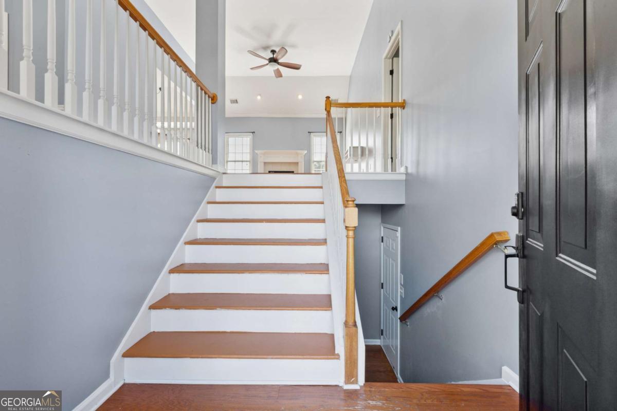 This beautifully maintained home blends comfort, space, and upgrades in one of Buford's most desirable areas. ? Highlights: 5 bedrooms, 3 baths, including a recently finished 5th bedroom downstairs, ideal for guests, teens, or an in-law suite. Elegant details: hardwood floors, tray/vaulted ceilings, cozy fireplace, and a chef's kitchen with breakfast bar. Spacious primary suite with sitting area, spa-style bath, and walk-in closets. Outdoor living at its best: privacy fence (3 yrs), patio extension (3 yrs), hot tub & hot tub slab (3 yrs), new deck (1 yr), plus covered grill area. ?? Subdivision Amenities: Pool, lighted tennis & pickleball courts, playground, and walking paths. ?? Location Perks: Top schools, minutes to Mall of Georgia, Bogan Park, Lake Lanier, Ivy Creek Greenway, and Historic Downtown Buford's dining, shopping, and arts scene. Easy access to I-85 and I-985. ? Why It's Special: This home offers space for every stage of life, resort-style community perks, and a location that puts everything you need at your doorstep.