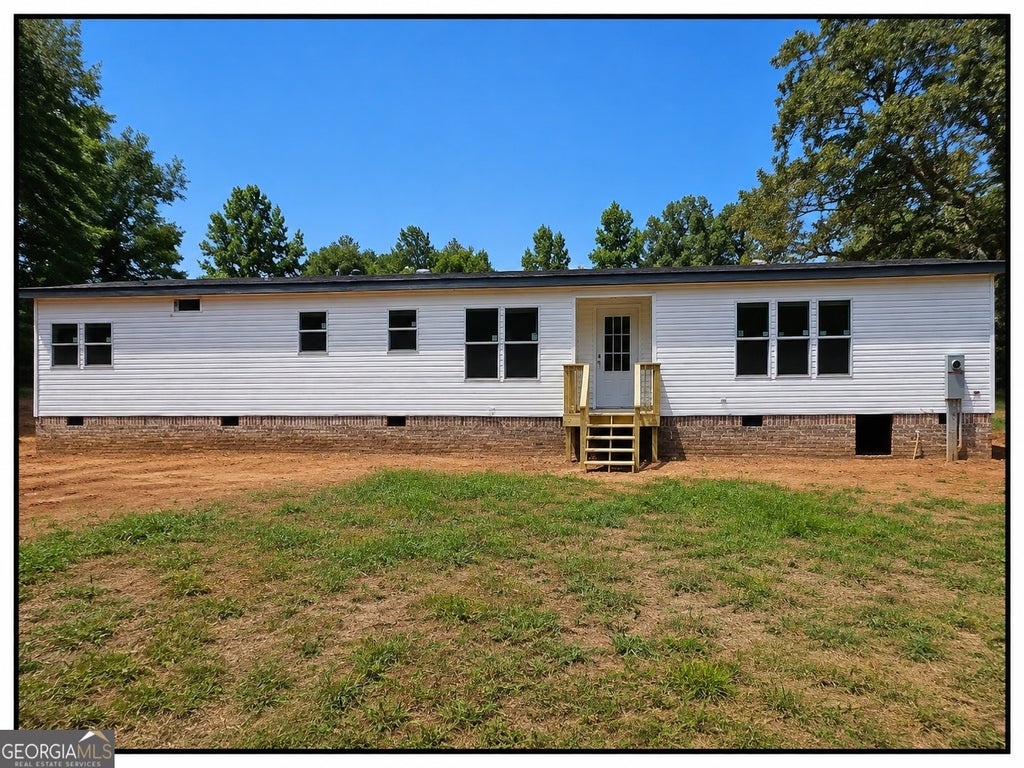 Photo of 125 Wessmanor Drive, Bowdon, GA 30108 (MLS # 10817069)