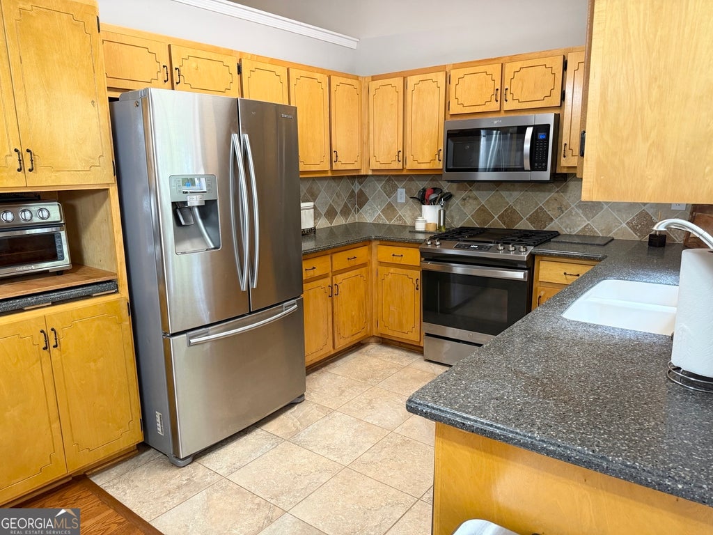 Photo of 177 Country Mill Lane, Stockbridge, GA 30281 (MLS # 10803972)