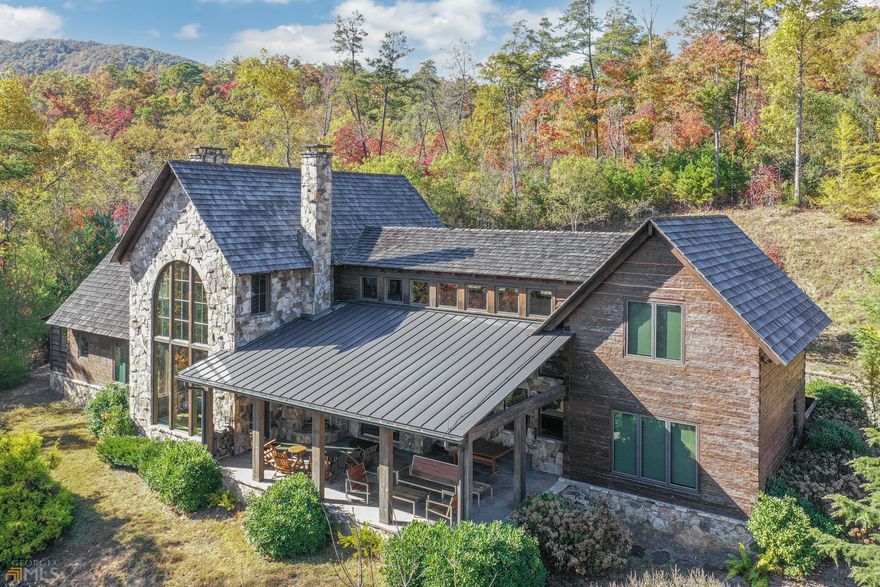 985 Baker Branch is a luxury 4 BR, 4.5 BA  home on 2.55 acres within the 310.83 acre compound known as High Valley Mountain Retreat. The entire property, including 985 Baker Branch, is offered for sale for the offer price of $7,990,000. It includes four dwellings plus various amenities. For more detailed information, please call Lynda Hester at 770-480-5161 or visit www.HighValleyMtRetreat.com. Proof of funds is required for scheduling showing appointments.