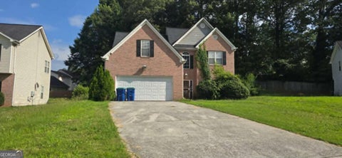 Photo of 120 Oak Park Terrace, Atlanta, GA 30349 (MLS # 10876220)