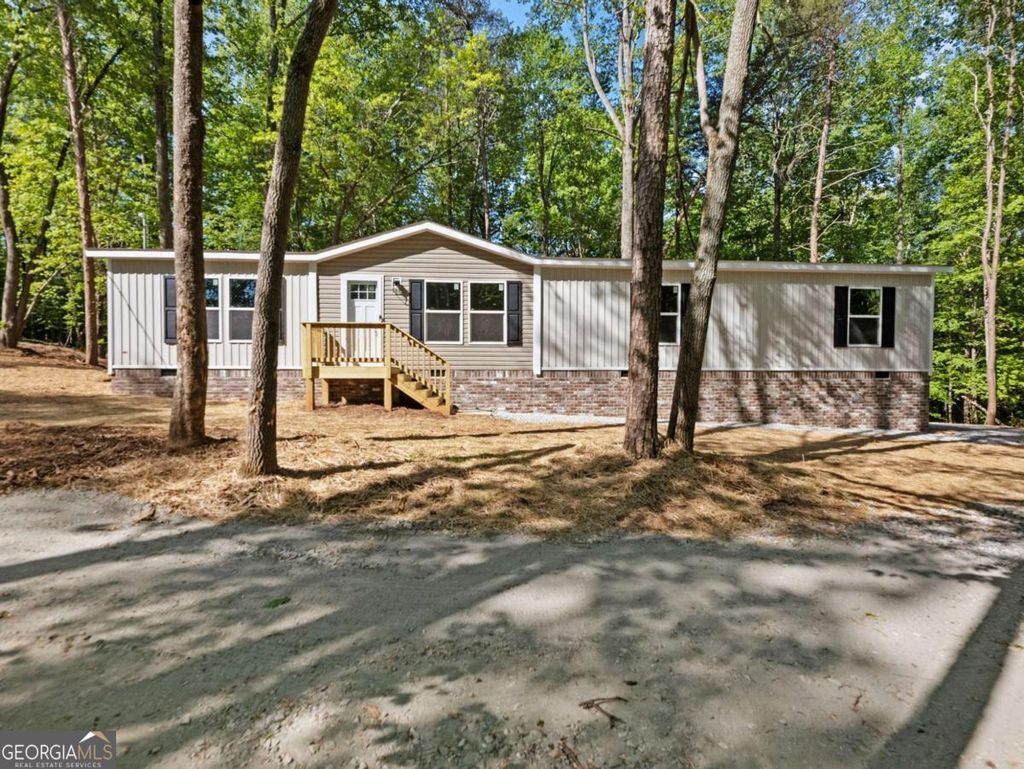 Photo of 3045 Fowler Road, Gainesville, GA 30501 (MLS # 10739382)