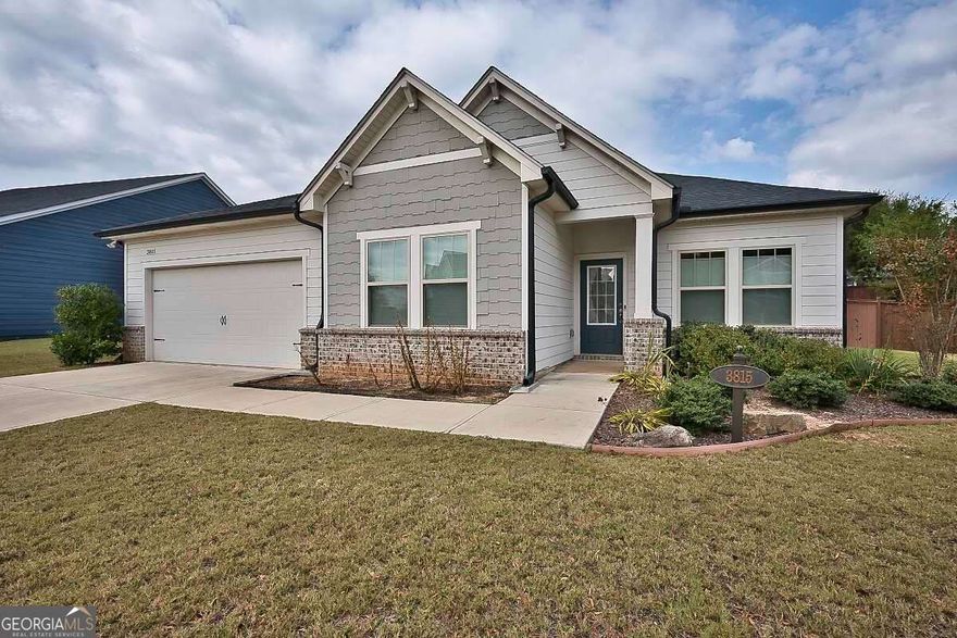 Welcome to this beautifully maintained 3-bedroom, 2-bath ranch-style home in the desirable Westhaven subdivision of Cumming, Georgia. This residence offers the perfect combination of comfort, convenience, and single-level living - ideal for families, downsizers, or anyone seeking an easy-living layout in a friendly neighborhood.   Step inside to a bright, open floor plan featuring Luxury Plank floors, vaulted ceilings, and large windows that fill the home with natural light. The spacious Great room with a cozy fireplace flows seamlessly into the dining area and gourmet kitchen, complete with quartz countertops, stainless-steel appliances, tile backsplash, and crisp white cabinetry. The owner's suite on the main floor provides a private retreat with a tray ceiling, large walk-in closet, and a spa-inspired bath featuring dual vanities, a double tile shower. Two additional bedrooms share a beautiful full bath, making this layout ideal for both family and guests. Enjoy your morning coffee or evening glass of wine on the covered patio overlooking the professionally landscaped backyard - perfect for relaxation or entertaining.   The Westhaven community offers resort-style amenities including a swimming pool, clubhouse, playground, and walking trails, and it's conveniently located near top-rated Forsyth County schools, shopping, dining, and GA-400.