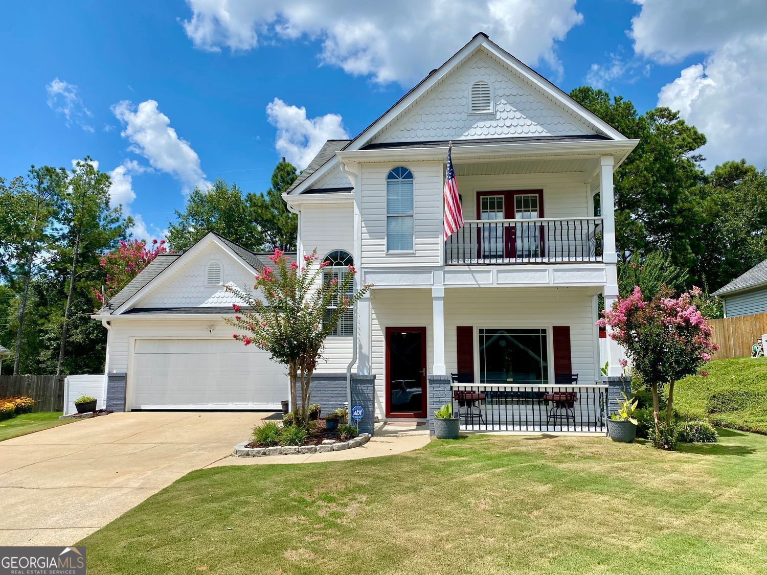 Welcome to 2156 Racoon Court, located in Mirror Lake, a 36 holes of championship golf/ swim/ tennis/ pickleball/ playground/ lake with fishing & kayaking- sailing- canoeing on 96 acre Mirror Lake/ park & walking distance to Publix neighborhood that is just 3 minutes to I-20 & 5 minutes to everything Villa Rica! This home is in great shape with enhanced or new features throughout including flooring/ painting/ granite countertops & stainless steel appliances in the kitchen/ upgraded baths/ storm doors and perhaps as good as all of these items the landscaping might be the best feature! Sodded front and back yard, with a privacy fenced back yard that offers a covered back porch/ a deck/ a firepit area/ a golf chipping & putting area in an very private setting* Newer zoned heat and air/ water heater/ toilets along with carpeting & Luxury Vinyl Planking Flooring* With several community pools, and outstanding location that is so convenient to everything, you cannot go wrong with this great home* It is truly in move in condition* You can also walk to Pine Mountain City Park where you can mine for gold or ride the miniature train*The Greatroom offers a cozy fireplace for those cool winter evenings* The 2 car garage is a spiffy* There is a Home Office (which could be used as a Dining Room if desired)* The Eat In Kitchen brings plenty of space to whip up a great meal for your guests* Upstairs the Primary Bedroom is elegant with a balcony overlooking the culdesac* The new tiled shower and jetted tub brings it all home for you* Oh yeah, there are 2 more Bedrooms and a 2nd Full Bath plus a guest half bath on the main level* Come take a look as soon as you can, you will Love this home!
