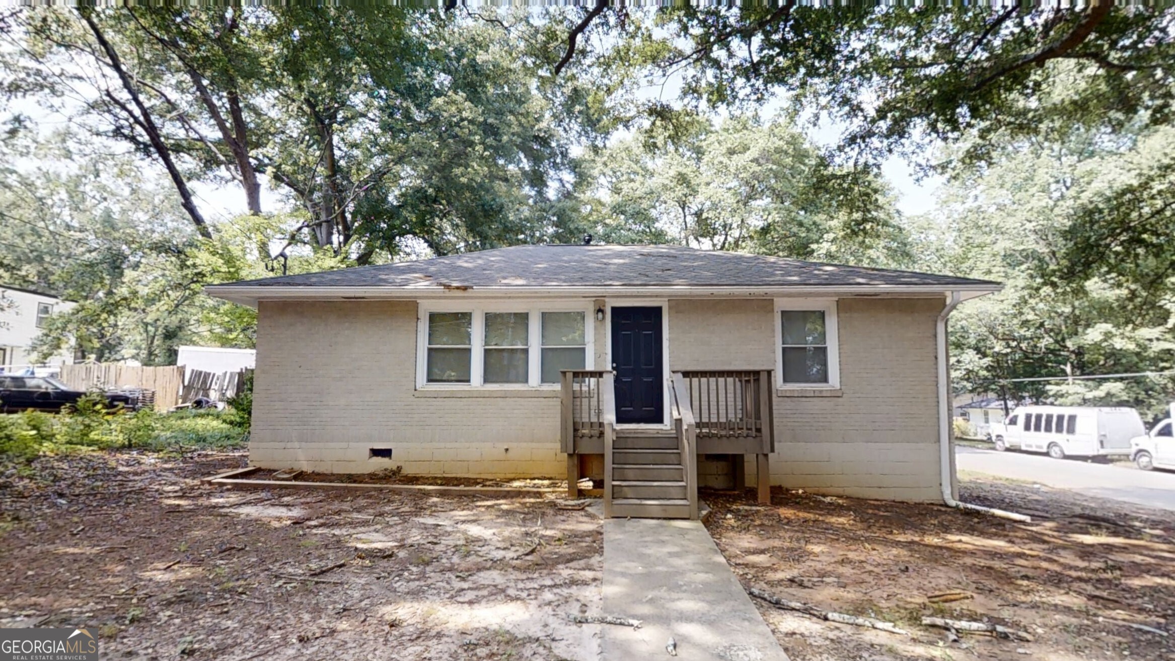 Welcome to this beautifully updated 3-bedroom, 1-bath ranch nestled in the heart of Atlanta! This move-in-ready home features stylish LVP flooring and fresh paint throughout, creating a bright and modern feel. The kitchen boasts crisp white cabinets and sleek granite countertops. Step outside to a spacious rear deck and large backyard perfect for entertaining guests or enjoying peaceful evenings outdoors. Located just minutes from the iconic Mercedes-Benz Stadium, a vibrant mix of restaurants and shopping destinations, and the scenic Browns Mill Golf Course, this home offers both comfort and convenience. Don't miss this opportunity to own a gem in one of Atlanta's most connected neighborhoods!