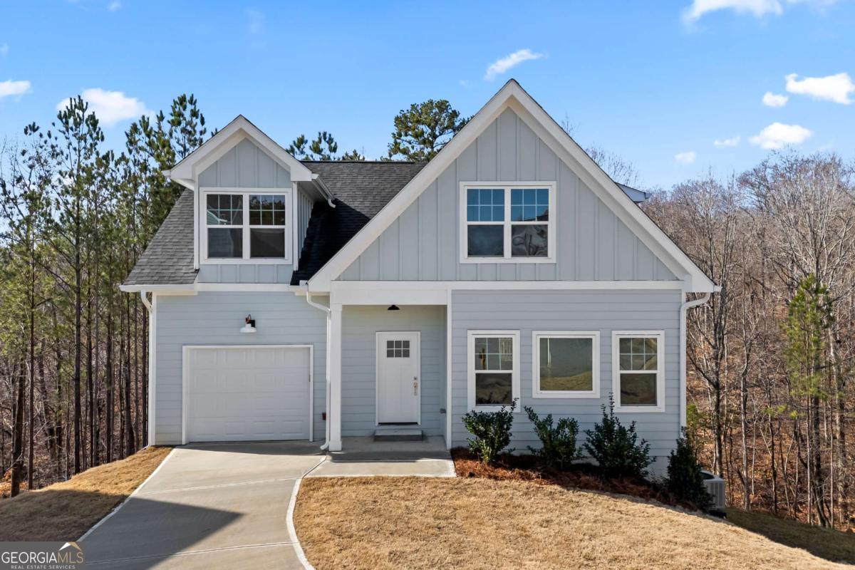 This stunning NEW CONSTRUCTION home is a true charmer, featuring elegant Board and Batten accents that enhance its inviting curb appeal. Offering 3 bedrooms and 2.5 baths, this home is designed for both style and functionality. Step inside to an open-concept living space filled with natural light from an abundance of gorgeous windows. The seamless flow from the living area to the dining space and kitchen makes it perfect for entertaining. True hardwood floors run throughout, while the bathrooms and laundry room are beautifully finished with tile. The bright and airy kitchen boasts a large island, white soft-close cabinetry, stainless steel appliances, and a charming Butler's Pantry with prep and display space, along with an impressive walk-in pantry. A convenient half bath is also located on the main level. The tandem garage features an epoxy-coated floor for durability and style, and just inside, a small drop zone adds extra convenience. Upstairs, you'll find three spacious bedrooms, including the Primary with a generous walk-in closet that flows into the Primary Bath, complete with a large tiled shower and double vanity. A tiled tub/shower combo serves the secondary bath, while a spacious laundry room adds ease to everyday living. The full unfinished basement provides endless possibilities for customization. Don't miss the chance to make this beautiful home yours. Priced BELOW appraisal!