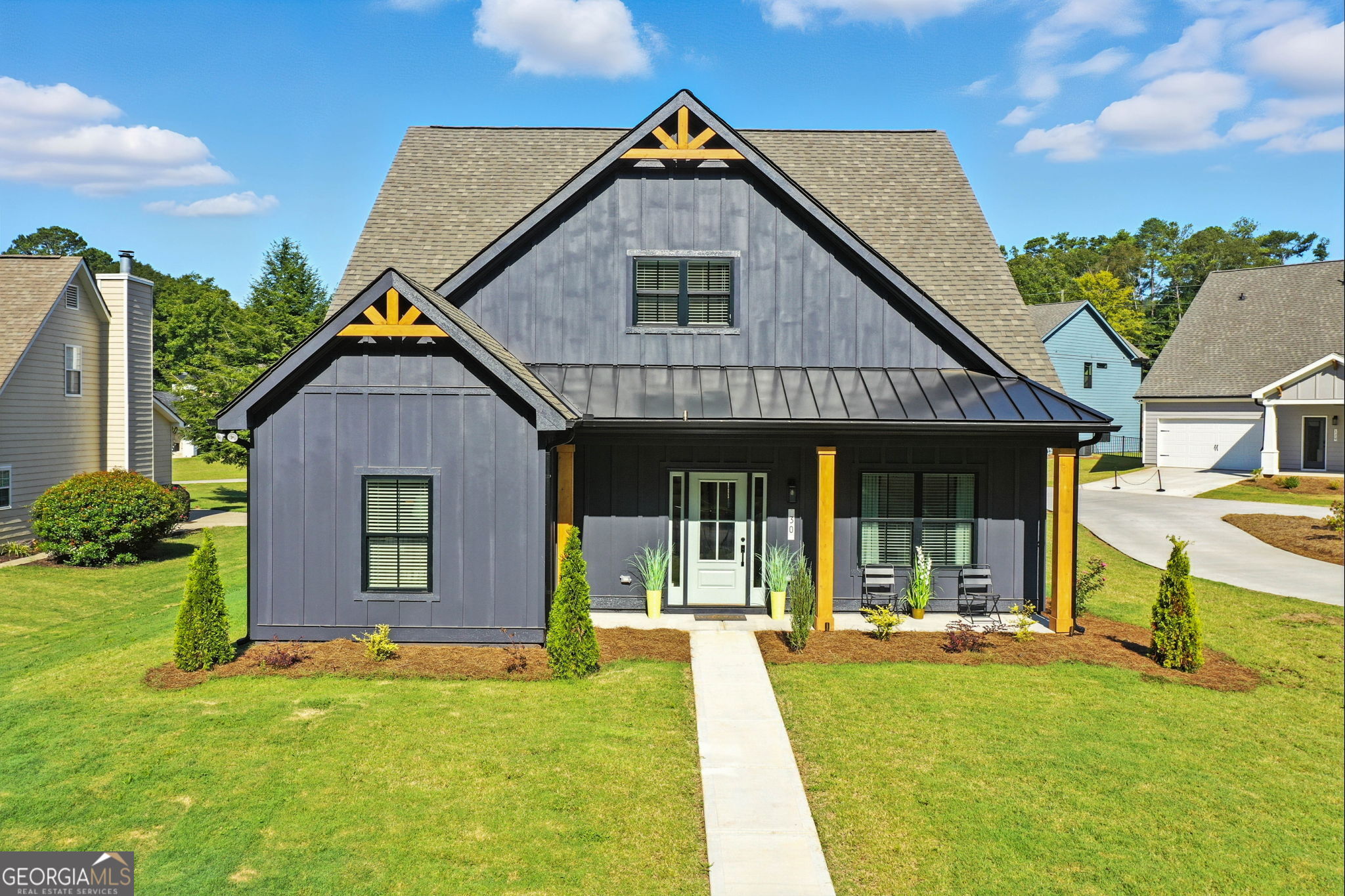 TO BE BUILT LOLA LITE- Fall into savings with 4.99% fixed rate or $20,000 of builder incentives* with September contract. Call us for details! Now selling at Ferguson Corners, a semi-custom boutique community by MarDon Construction-known for exceptional quality and luxury details. The Modified Lola Plan offers a spacious and open main level with designer finishes throughout. The chef's kitchen features quartz countertops, stainless steel appliances, upgraded soft-close cabinetry, and a large center island overlooking the dining area and family room-perfect for entertaining. The main-level primary suite includes a spa-inspired en suite bath and oversized walk-in closet. Also on the main floor: a private office/flex room with French doors, a stylish half bath, a custom mudroom, and a covered back patio. Upstairs you'll find two generous secondary bedrooms, a full bathroom, and a flexible loft area ideal for a media room, playroom, or second office. Located just minutes from Downtown Emerson, Downtown Cartersville, Red Top Mountain, and Lake Allatoona, Ferguson Corners offers a unique blend of style, comfort, and convenience. Ask about current builder incentives! Visit our model home or contact the onsite agent for more information. *The incentive is subject to lender and government restrictions. The offer is subject to change or may be discontinued. Your actual mortgage interest rate, APR, and closing costs may vary based on the loan product, your application and qualifications, and based on applicable closing costs and fees.*