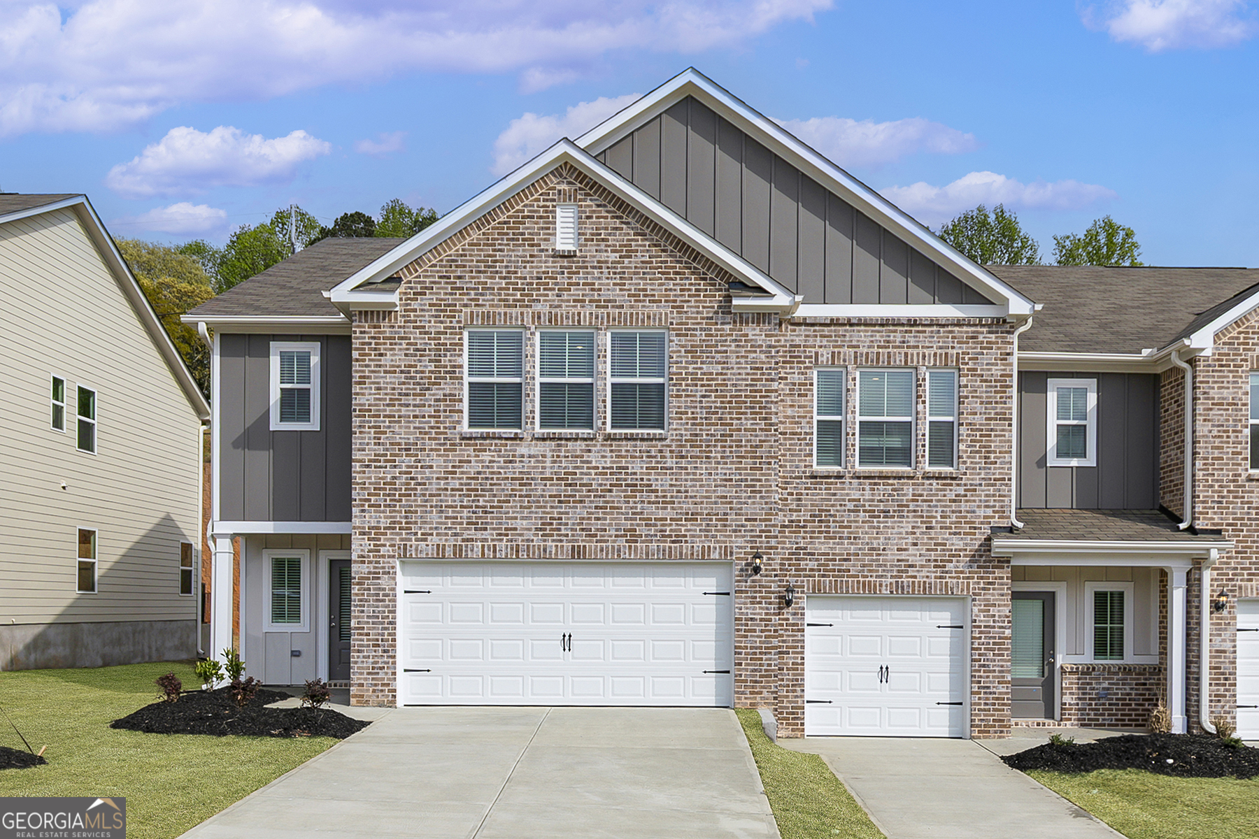 Welcome to the Laurel - Your Perfect Place to Call Home This spacious 4-bedroom, 2.5-bath home with a two-car garage is designed with both comfort and convenience in mind. With a gorgeous exterior accented by a subtle pop of color, the Laurel offers a stylish canvas for homeowners to make it uniquely their own. Enjoy plenty of parking options with space in your garage, driveway, nearby street, and convenient guest parking just steps away. Ideally located near the community mailboxes, close to the front entrance, and a short walk from the playground-this home brings everyday ease right to your doorstep. Whether you're enjoying a sunny afternoon stroll or watching your kids play outdoors, the Laurel at Oakwood Terrace is all about lifestyle. We can't wait to hand you the keys to your new home!