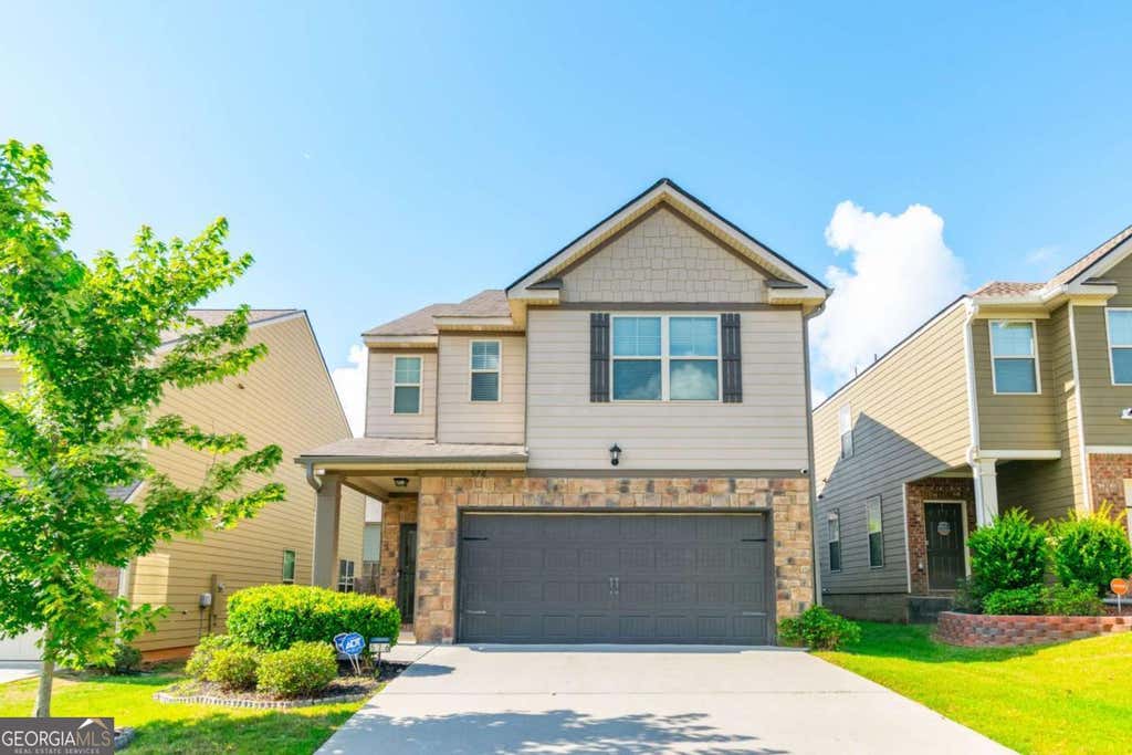 Photo of 576 Dasheill Lane, Atlanta, GA 30349 (MLS # 10827937)