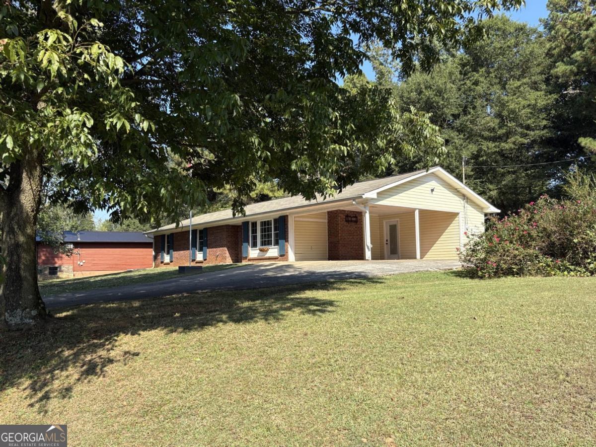 Charming 3 bedroom 2 bath stepless Ranch home on spacious lot...Perfect for first time home buyers or investors. This delightful stepless ranch home is nestled on a quiet, family-friendly street. This cozy yet spacious 3/2 property features brand new flooring throughout making this home move-in ready. The bright open floor plan is perfect for everyday living and entertaining. The kitchen comes equipped with all appliances, including a washer and dryer, making it convenient and stress-free for your move. With a large lot this home offers both a beautiful front and back yard, providing plenty of space for outdoor activities, gardening, or relaxation. A shed is also included for additional storage needs. Whether you are looking for your first home or are an investor this charming property offers everything you need in a great neighborhood.