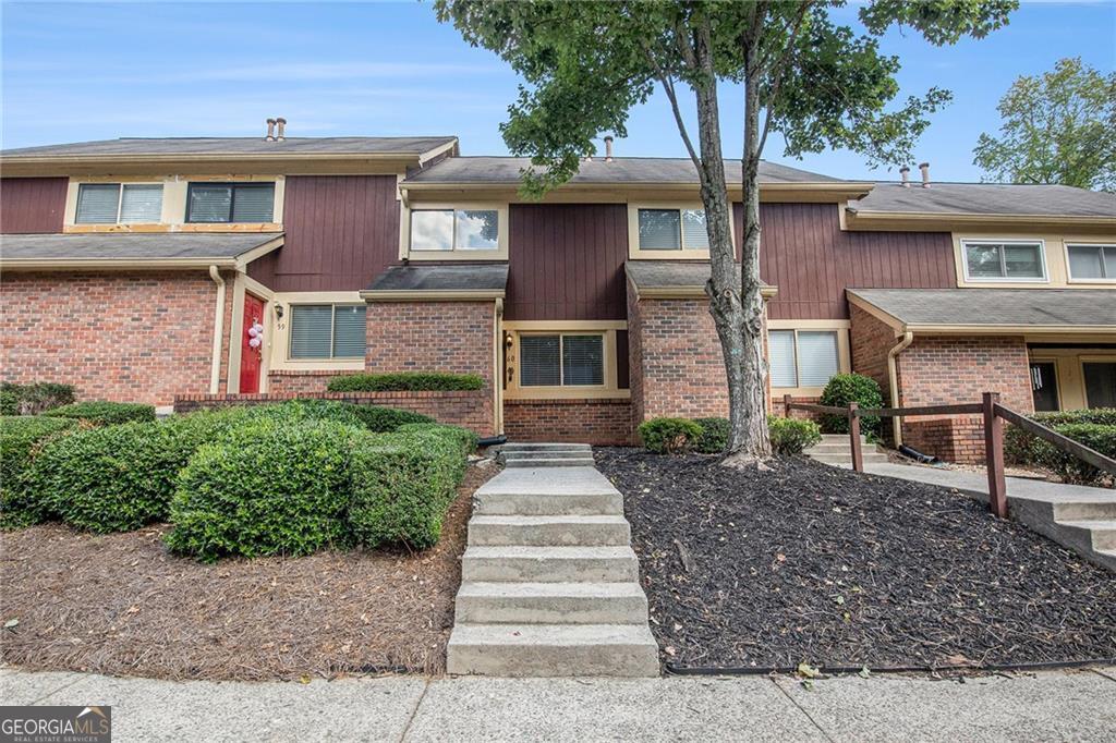 Updated 2BR/1.5BA two-story condo in Alpharetta, ideally located less than one mile from the vibrant Avalon. The main level features a great room, kitchen, half bath, and access to a private fenced patio. The kitchen is updated with stone countertops, newer appliances, and an undermount sink with a new faucet. Upstairs, you'll find two spacious bedrooms that share an updated full bath. Additional updates include new flooring and fresh paint throughout. HVAC - 2024. Laundry connections are conveniently located in the outside storage room.Situated just half a mile from GA-400, you'll have quick access to the best of Alpharetta, including the upscale Avalon shopping and dining district and the Ameris Bank Amphitheatre, one of North Atlanta's most popular concert venues.This home is in a highly rated school district, including Alpharetta High School, Webb Bridge Middle School, and New Prospect Elementary School. The community also allows rentals.