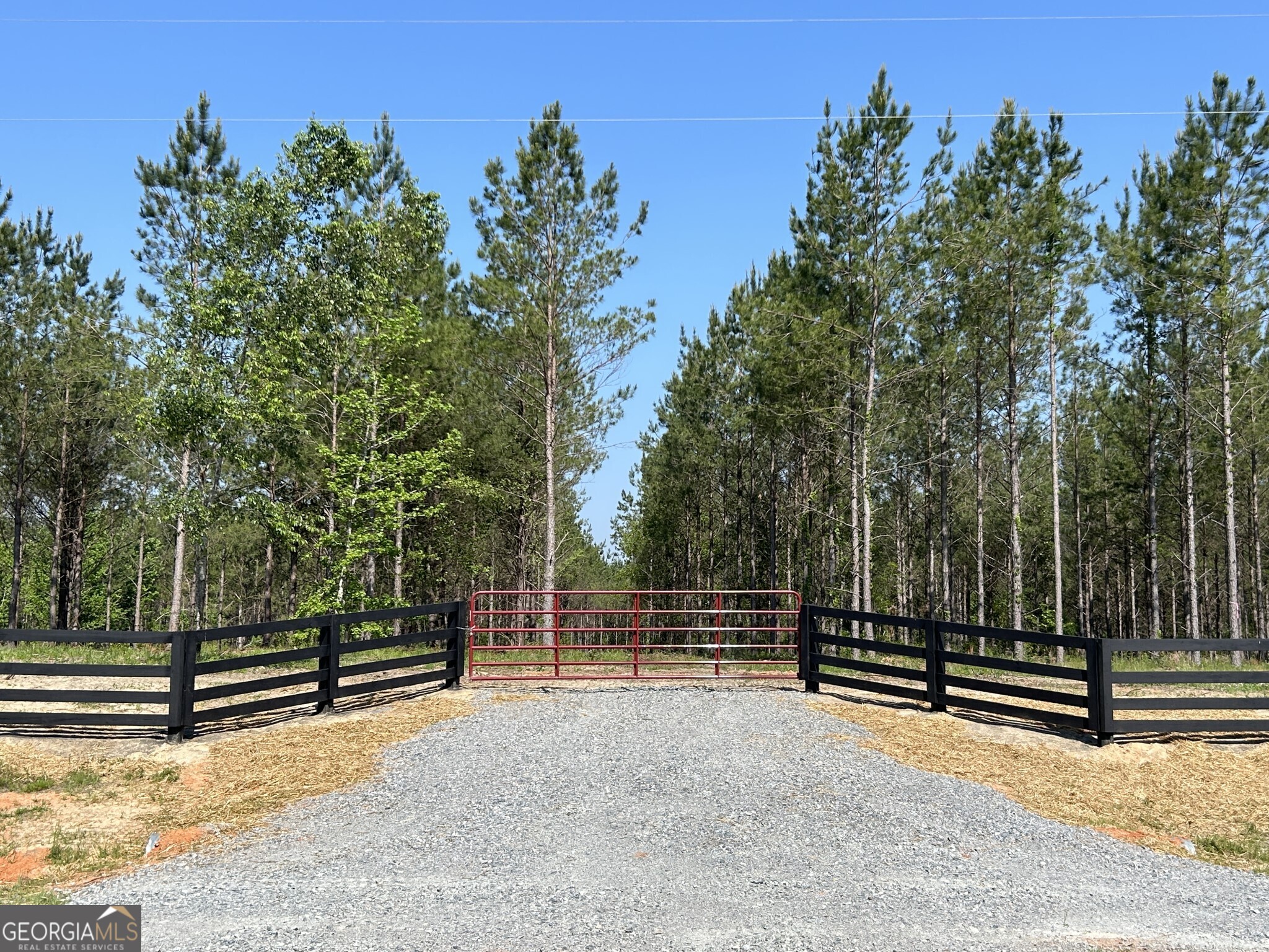 Bluewater presents 19 beautiful country homesites where you can enjoy peaceful living in a natural setting. Lot #7 offers 7.094 wooded acres with a small creek along the back property line, providing privacy and a scenic backdrop. The community features protective covenants, a gated entrance, paved road frontage, and access to an excellent public school district. Conveniently located just minutes from downtown Dublin and only 6 minutes from Interstate 16, Bluewater sits halfway between Atlanta and Savannah, offering both small-town charm and easy access to city amenities. With nearby shopping, dining, entertainment, and a thriving local economy, this is the perfect place to build your dream home, raise a family, and embrace the laidback country lifestyle.