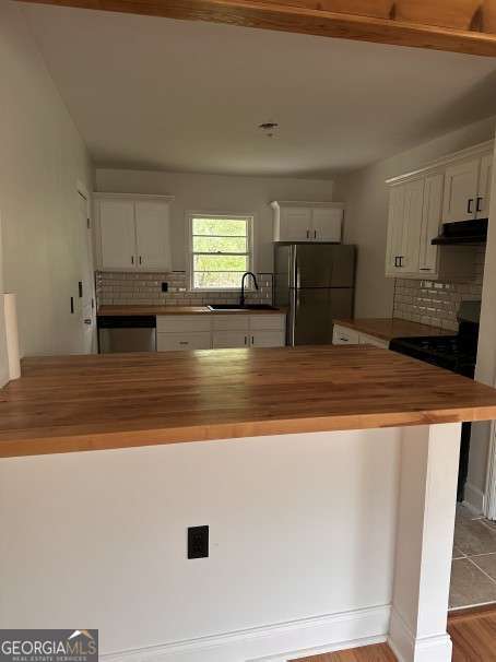 This bungalow is not only a luxe remodel, but the location is amazing. You are only a 5-minute drive to East Atlanta Village/ 7-minute drive to Little Five Points and Edgewood/ 10 minutes to Grant Park, Inman Park, you're in the heart of it all! This 3/2 stepless Ranch boasts all the modern touches!! The living area is wide open with plenty of space to relax in with bay windows. The kitchen is chef ready new countertops, new cabinets and SS appliances. Private backyard with lots of greenery for all your entertaining purposes. Schedule your showing today!