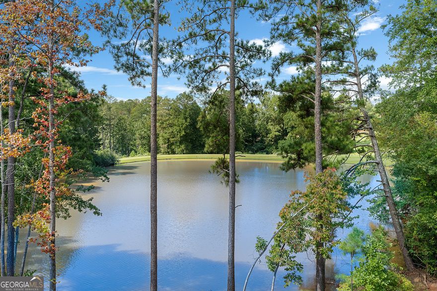 Rare opportunity to purchase extraordinary lot in The Manor Golf and Country Club.  1.8 acres is located at the end of a cul-de-sac, on a picturesque pond, and overlooking three golf fairways.  Lot 75 is the location of the original homesite of the original Manor land owner.  Waterfront dock.  Gated neighborhood.  Unparalleled amenities include two Clubhouses, indoor and outdoor pools, indoor and outdoor tennis courts, fitness center, Tom Watson designed Golf Course.  Sidewalks throughout community.   Close to the Greenway, shopping, restaurants.  Great school district.  Property purchase requires membership at Country Club AND HOA Dues.  The views from this lot are spectacular