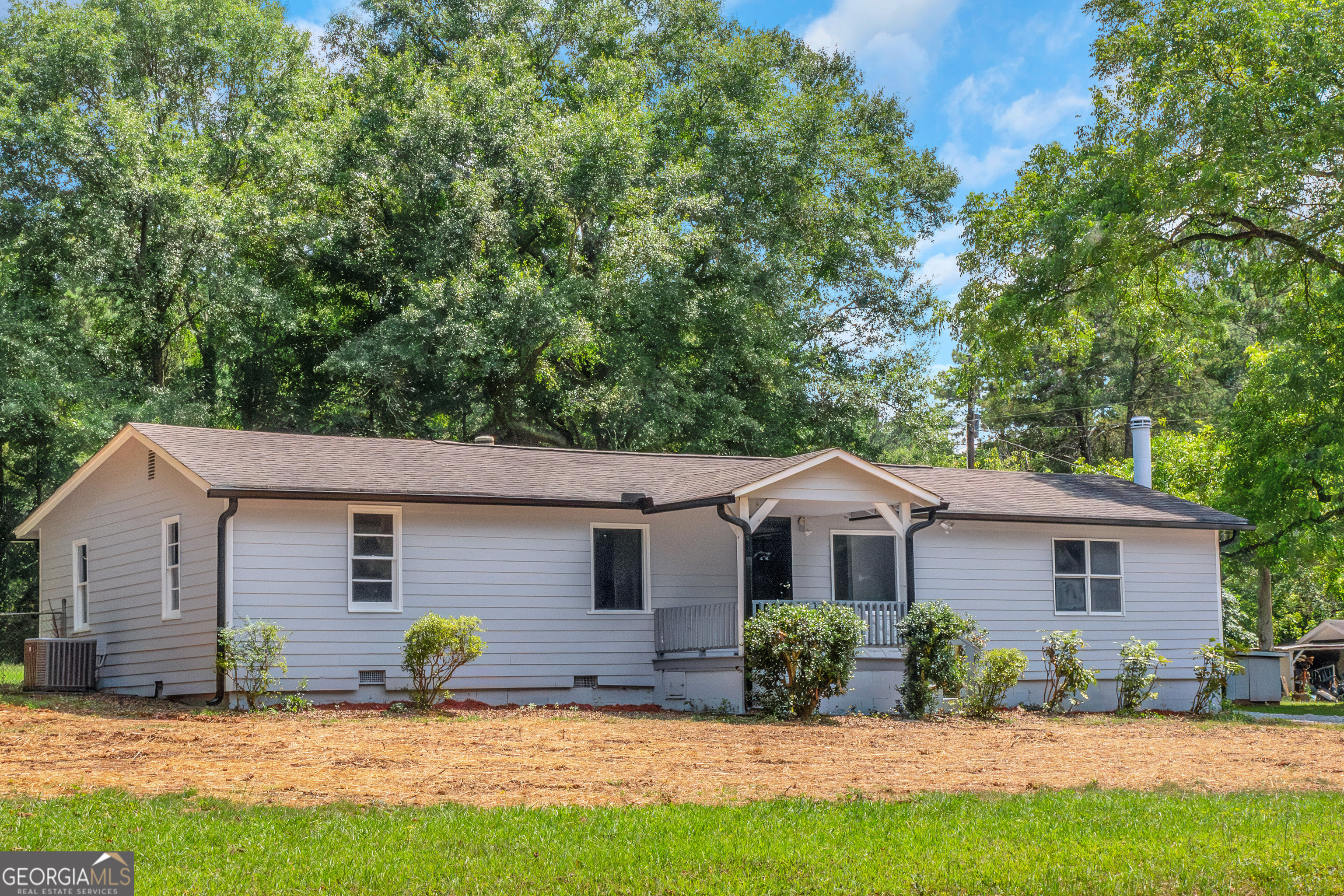 Beautiful RANCH home in Stockbridge. This house features over 1 ACREA LAND with NO HOA. You will find a nice kitchen with two full baths and three beds inside. Like new HVAC system roof and WATER heater. This house is ideal for first-time buyers, short-term Airbnb rentals or long term investment. The HUGE backyard is the perfect spot to rela, BBQ under the shade or farming!!! There are plenty of spaces to entertain all your families and friends. The backyard is ideal for PARKING AND STORAGE.