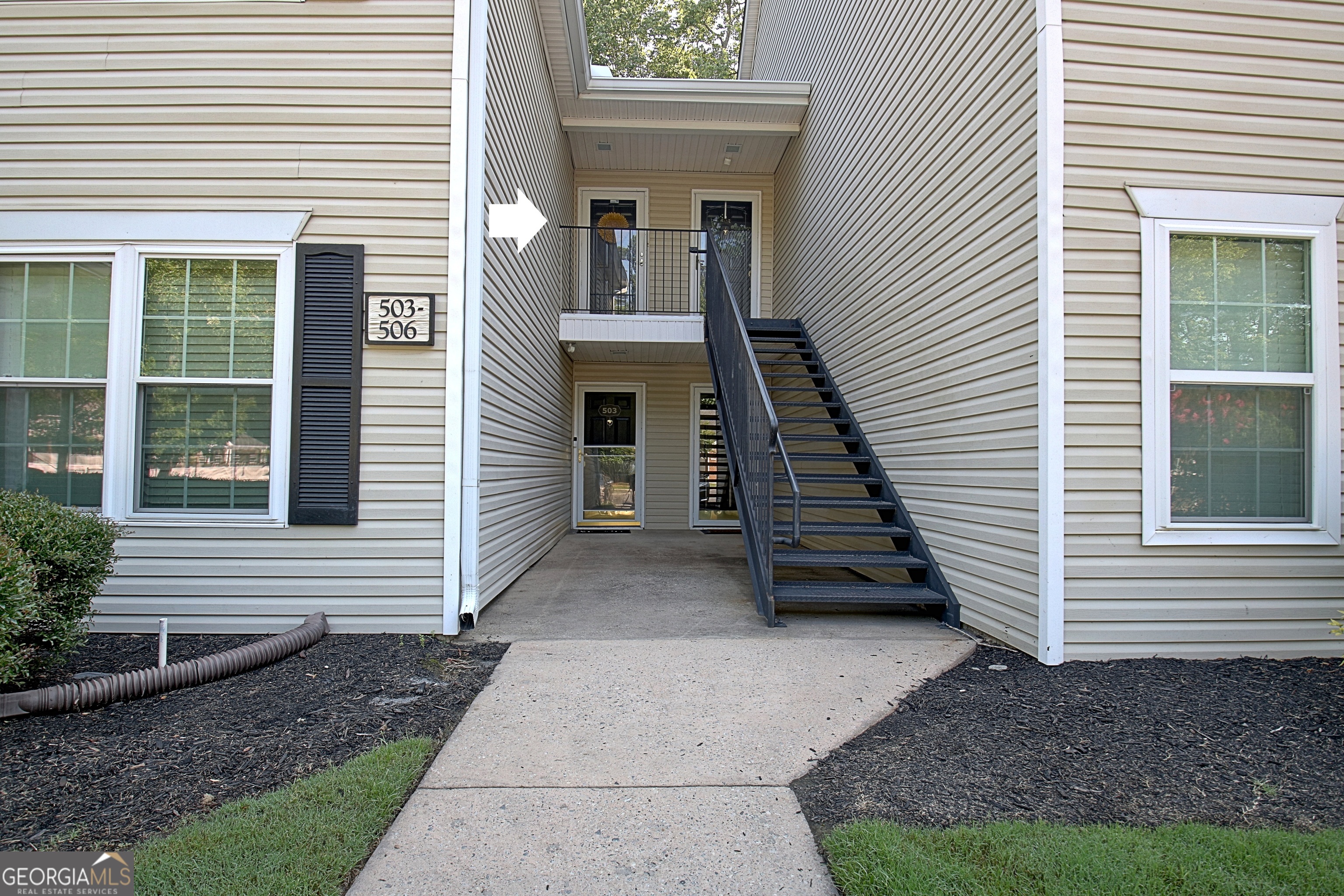 Lakefront Living in the Heart of Peachtree City! Enjoy the ease of low-maintenance living in this beautifully updated 2 bed, 2 bath condo with serene lake views right from your back patio. The inviting family room features a cozy gas log fireplace and is filled with natural light from the numerous windows, creating a bright, open feel throughout. The kitchen opens to the living space and includes a breakfast bar, tile backsplash, and modern light fixtures, while the breakfast area with a large window makes the perfect spot to enjoy your morning coffee. With hardwood flooring throughout the main living areas and tile in the bathrooms, this home combines style with durability. Whether you're relaxing on the patio watching the sunset over the lake or entertaining guests in the open-concept living space, this condo is the perfect place to call home. Located in sought-after Peachtree City, with golf cart paths, shopping, and dining nearby-this one won't last long!