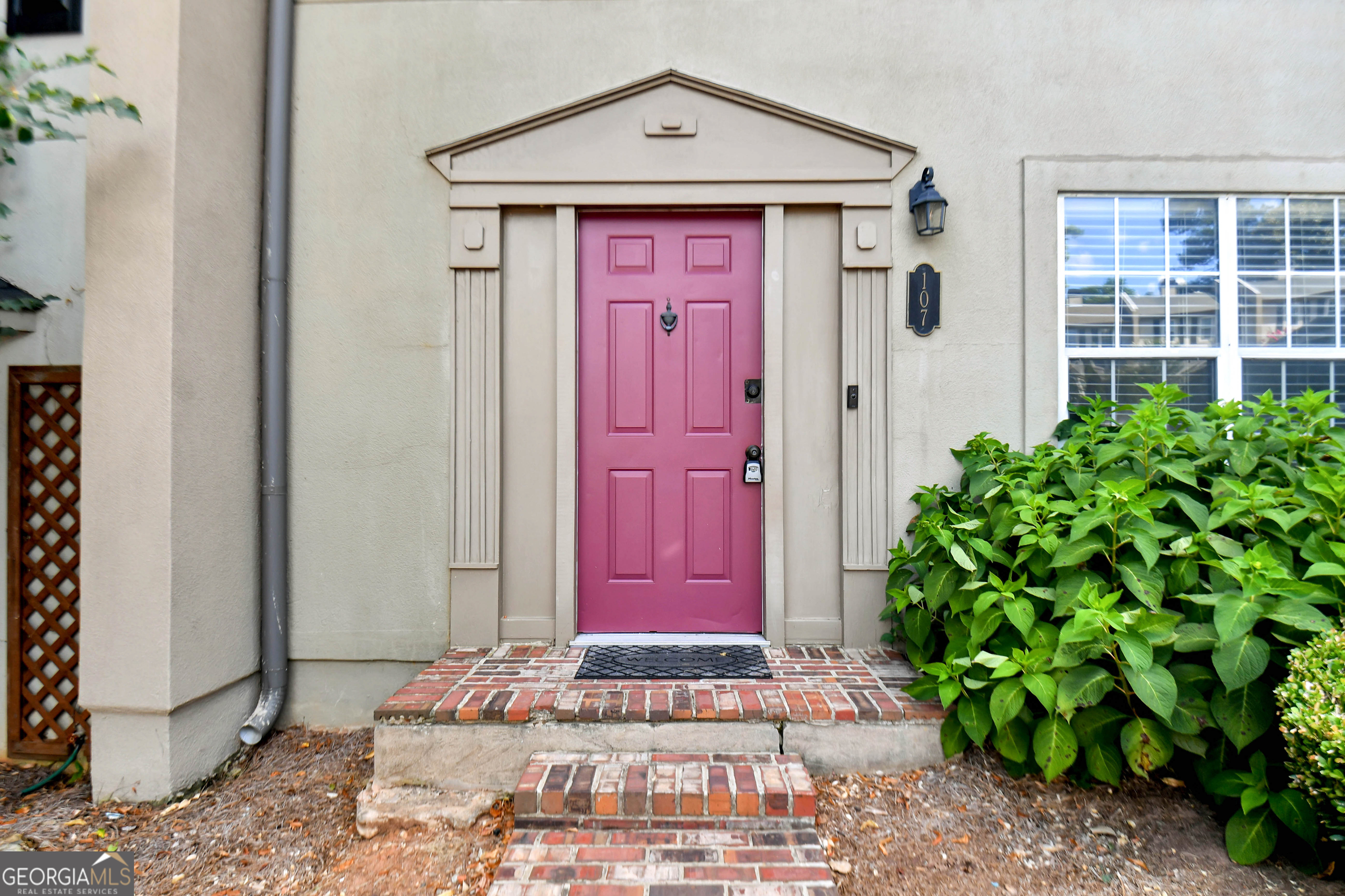 Welcome to 107 Tamara Court! This 2 Bedroom 2.5 Bath has been beautifully renovated and ready for it's new owner to enjoy! Park in your assigned parking space then enter the foyer to cherry wood finishes on the fireplace mantle and shelves and beautiful tiles floors. The ship lap walls add wonderful character with the reading nook created to the left under the stairs.Under the reading nook, there's even a private space for your furry friends. Continuing into the kitchen, you'll pass your half bath on the main and you'll find your eating area along with your cooking area with granite countertops. Upstairs you'll find both bedrooms with their own en-suite and enough space for comfort. Out back, you have your private patio, storage and green space to relax. This townhouse is perfect for a small family or roommates alike. Come see it today!