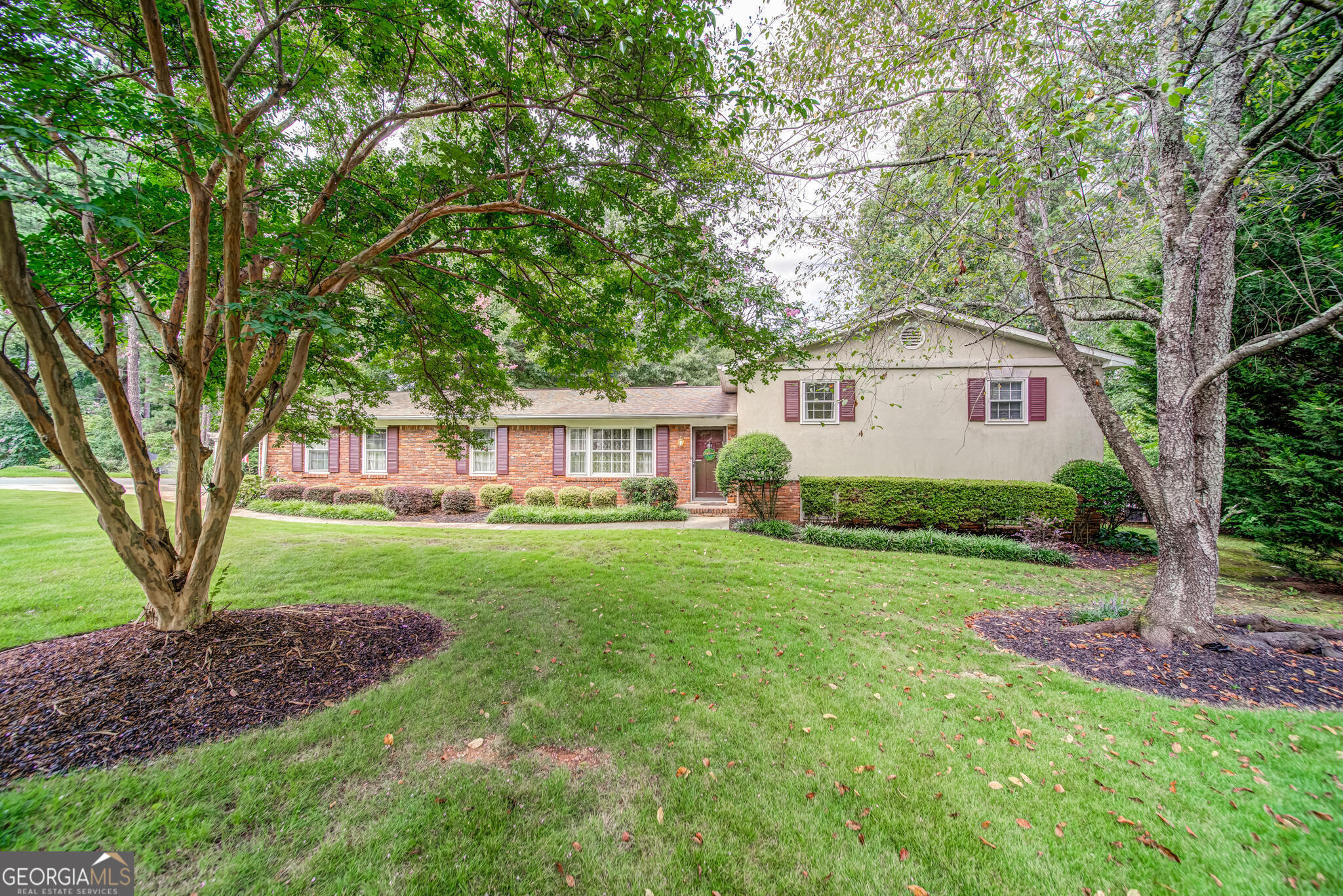 Location, Location! Nestled on a spacious corner lot in the Addison / Simpson/ Sprayberry /Lassiter School district w this stunning split level home features 4 bedrooms plus a flex room, that can be 5th bedroom. Boasting over 3000 sf, the layout includes a large living room, updated kitchen, and dining area. Two bedrooms upper level w the master suite with a walk-in closet. There are two additional bedrooms lower level, with flex room annd large laundry room. Outdoors, enjoy a custom deck, gazebo, hot tub, patio with tiki bar, and second gazebo for outdoor living space. For those needing a private office, there's a space in the detached 1.5-car garage. Abundant storage options include storage buildings and a playhouse. Water sprinkler system W zoysia grass This house is for the entertainment enthusiasts in the backyard oasis.