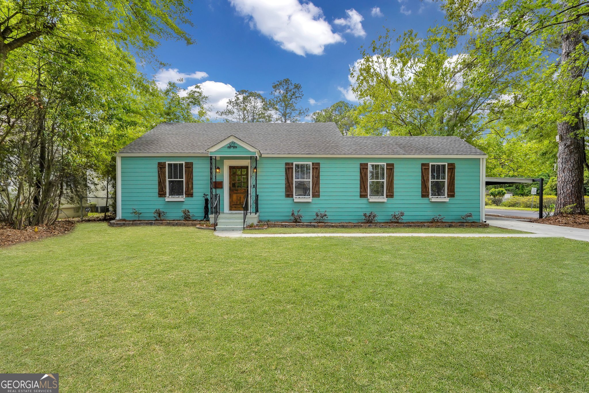 **Priced $15k below the appraised value (instant equity)! Stylish and move-in ready, this fully renovated home in desirable MIDTOWN offers space, charm, and flexibility. The 4 bed, 2.5 bath main home features 2,040 sq ft of open living with refinished hardwoods, quartz countertops, stainless appliances, custom tile, walk-in closets, and a peaceful primary retreat with upscale finishes and a walk-in shower. Taken down to the studs in 2020, updates in 2020 included new roof, HVAC, windows, siding, plumbing, and electrical. A DETACHED 1 bed/1 bath, 450 sqft STUDIO is perfect for guests, RENTAL INCOME, or a home office. Enjoy a screened-in patio and a large fenced backyard with room to add a pool. A workshop adds versatility. Located just 10 minutes from downtown Savannah and walking distance to Habersham Village, this home blends classic charm with modern comfort in a prime location.