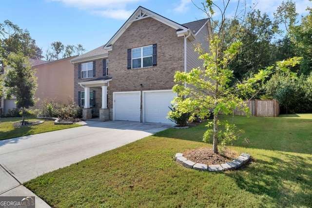Photo of 3152 Hawthorn Farm Boulevard, Loganville, GA 30052 (MLS # 10879519)