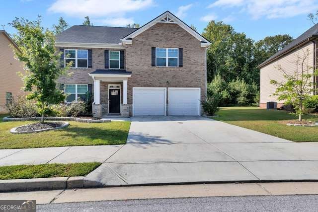 Photo of 3152 Hawthorn Farm Boulevard, Loganville, GA 30052 (MLS # 10879519)